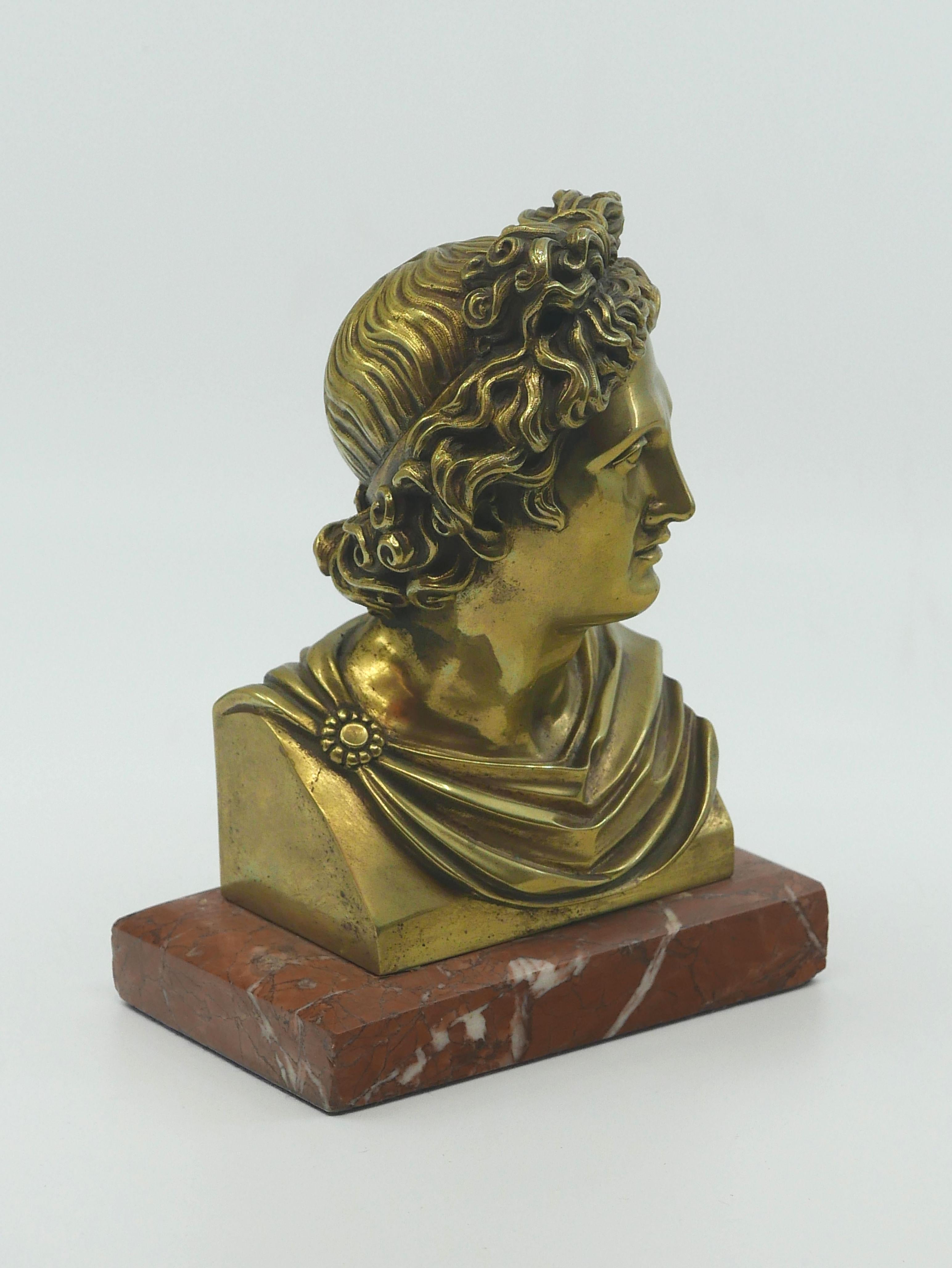 A wonderful polished bronze bust on a marble base, perfect for a curio cabinet, desk or bookshelf. so many places this would look stunning. The casting and chasing of this bronze is nearly perfect and what is not to love about the old label on the
