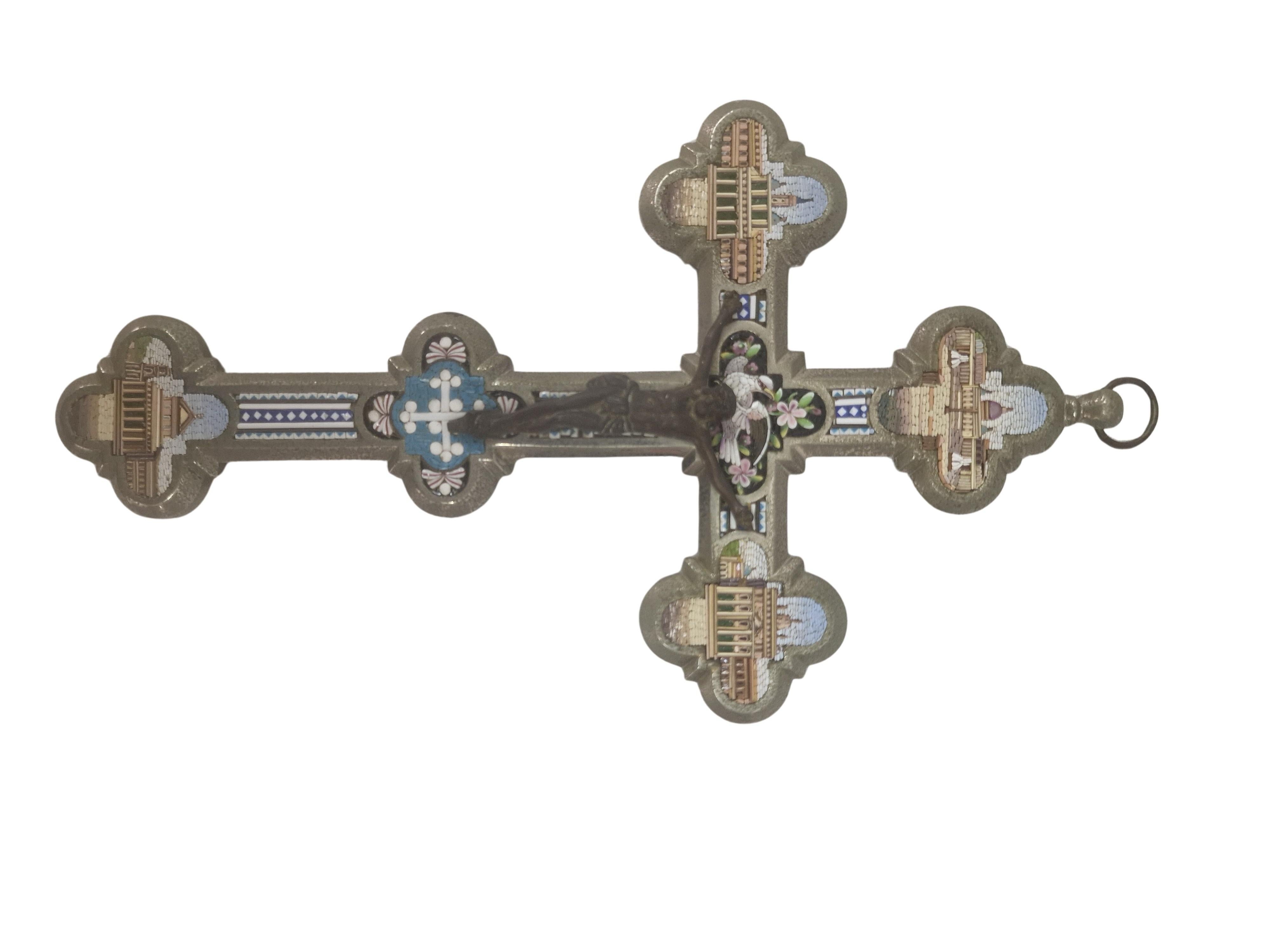 Wonderful cross with micro mosaic inlays, it is an early example of a souvenir - perhaps from a pilgrimage - to Rome, Italy, made in the 1920s / 30s.

This so-called Grand Tour object is of special quality. All free areas of the front are covered