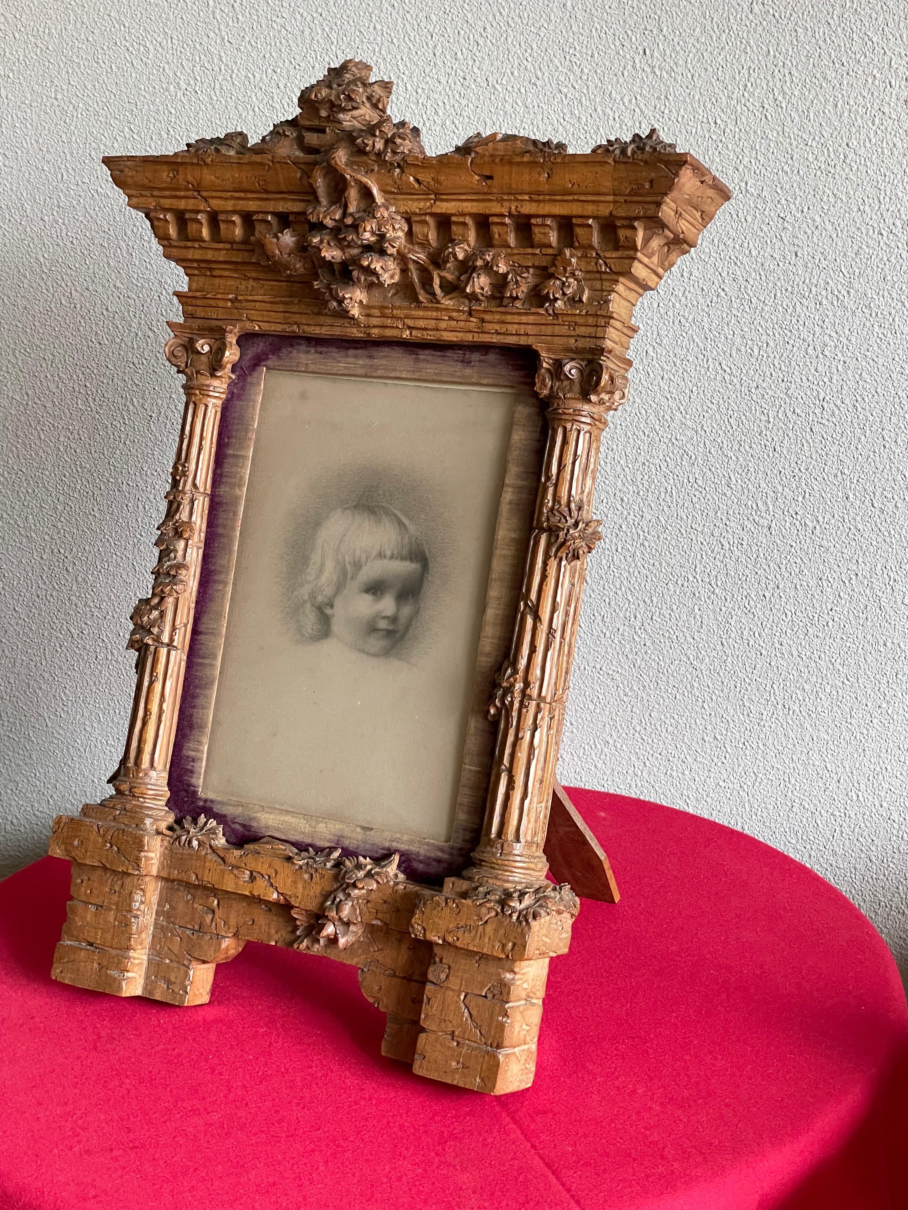 Amazingly hand-carved photo or picture frame with a top quality, original drawing of a girl.

If ever there was an antique work of art 'with a soul' then this unique and all original, 'grand tour relic' would be it. Both the hand carved temple