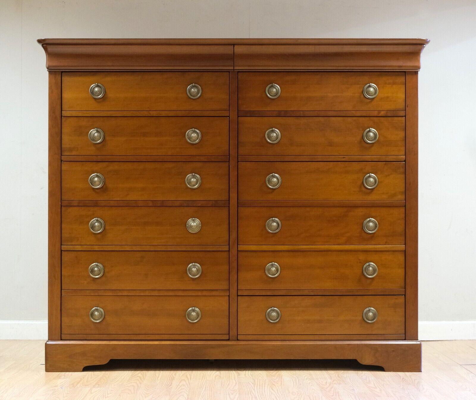 We are delighted to offer for sale this stunning Grange brown Cherry wood tall chest of drawers on plinth base.

This well made, sturdy, and simple but yet stunning chest of drawers speaks for itself about good quality and perfect design. The