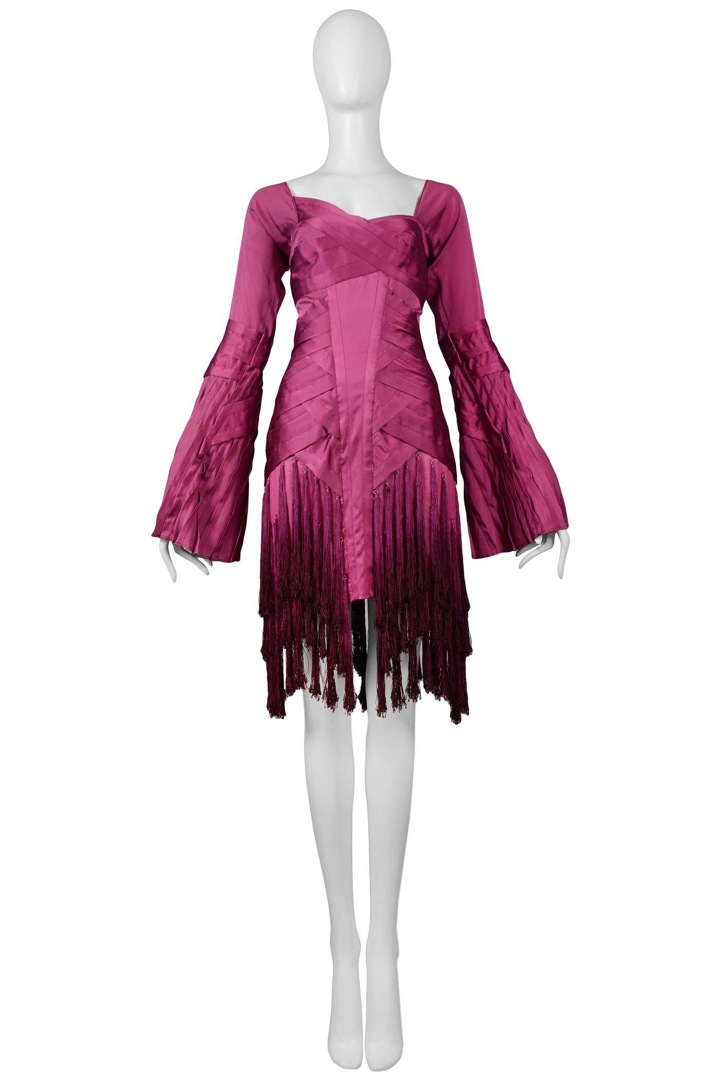 Resurrection Vintage is excited to offer this stunning vintage magenta Tom Ford for Gucci pleated cocktail dress featuring pleated sleeves and body, magenta beads, and fringe tassels. 

Gucci
Designed by Tom Ford
Size 42
Measurements Bust 33