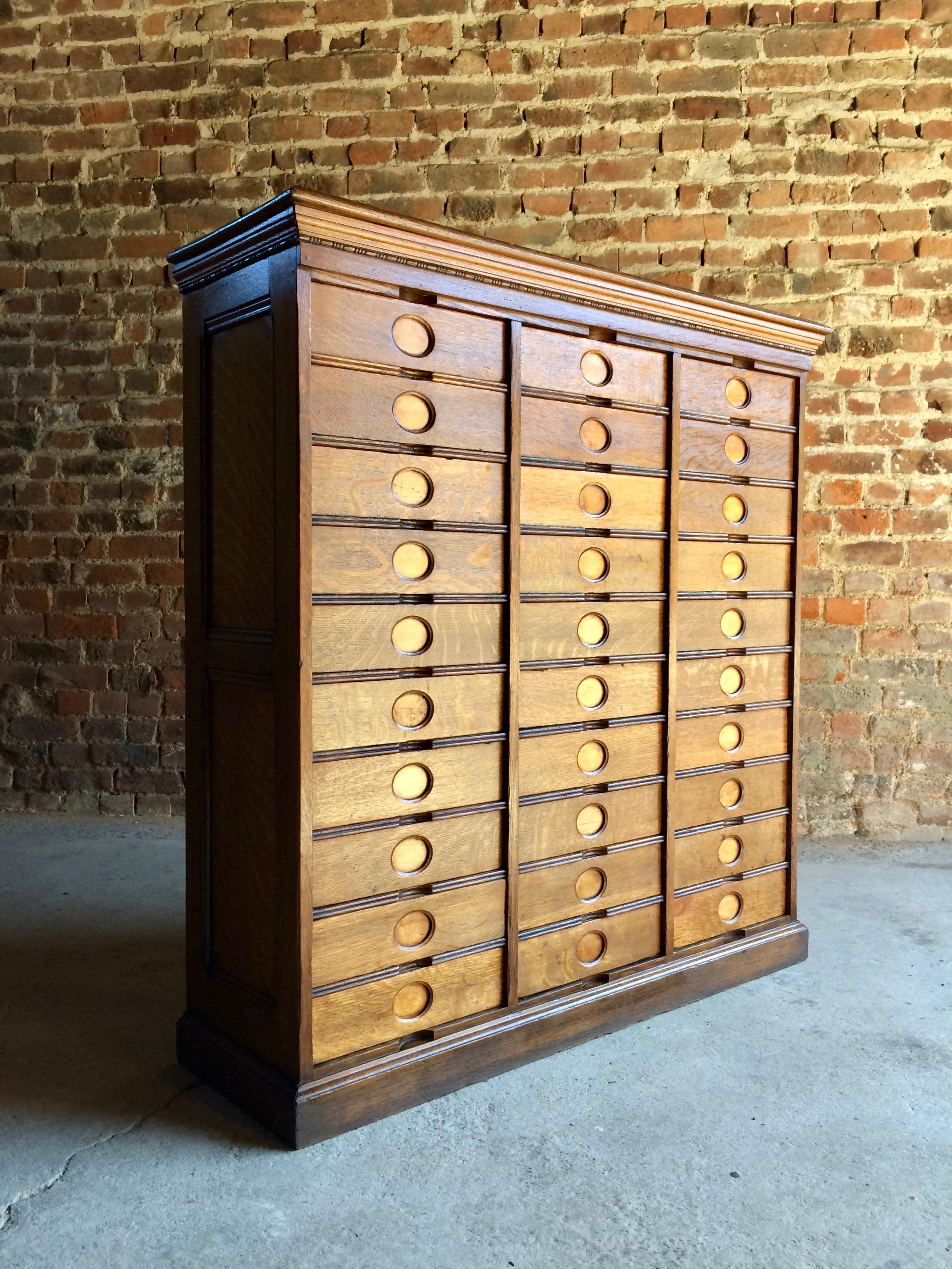 Amberg File & Index Co, 79-81 Duane Street, New York, Amberg’s imperial letter file cabinet, solid oak, thirty drawers and dates to 1st May 1909, she’s a beauty.

Amberg 
American
circa 1909.
Letter filing cabinet
Oak
Loft style
Bank of 30