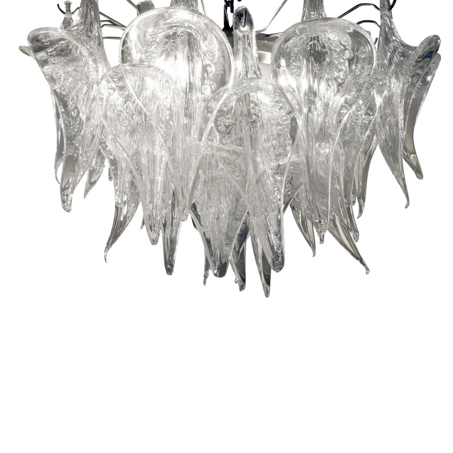 Chandelier with sculptural hand-blown pulegoso glass (with air bubbles) horns, Murano Italy, 1970's. This chandelier is very striking.

H: 17 inches (glass part only) / chain can be adjusted to any height.