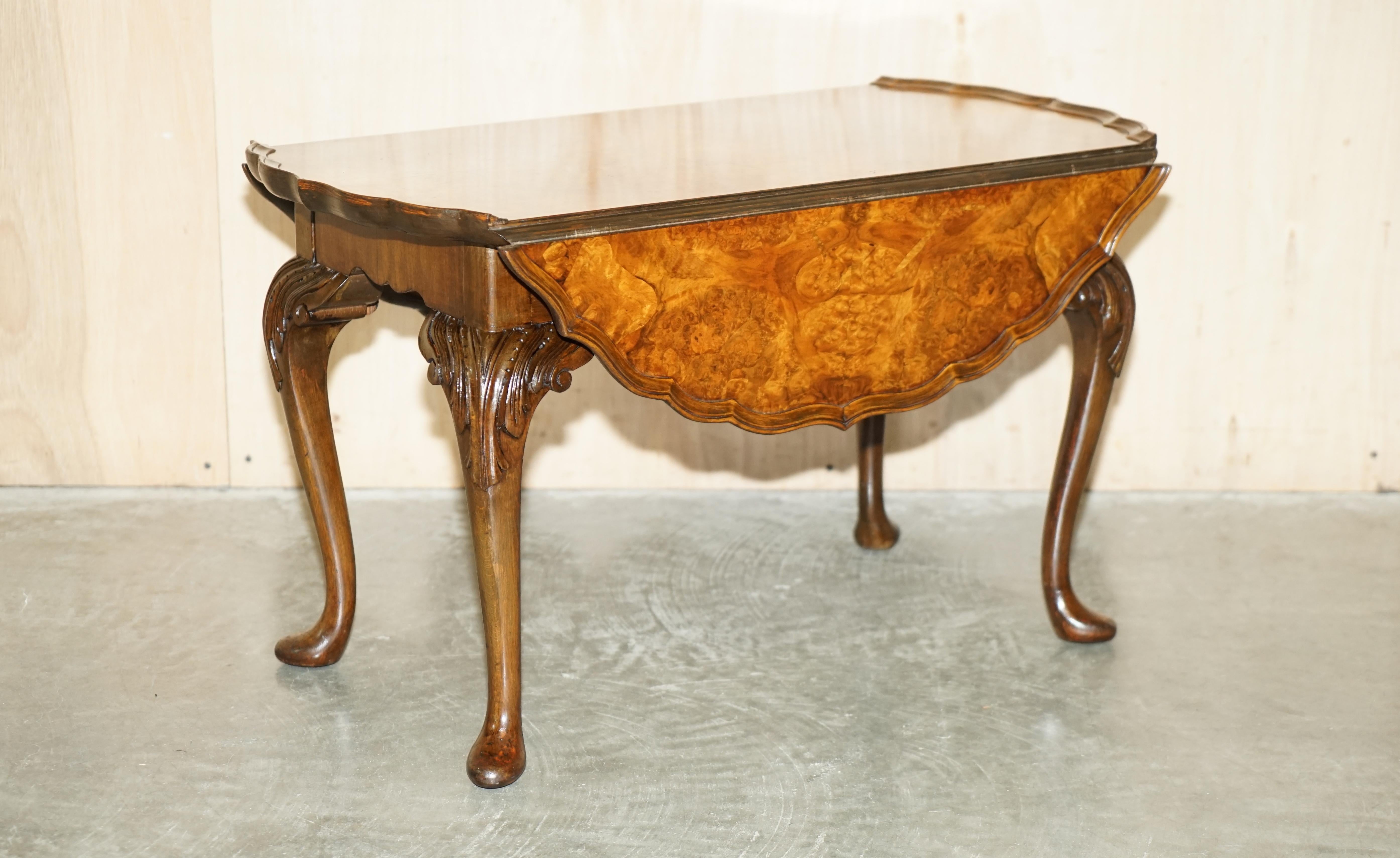 We are delighted to offer for sale this stunning hand made in England, quarter cut and burr walnut, extending coffee table with stunning timber patina and scalloped edge pie crust top 

A good looking, well made and decorative coffee table with