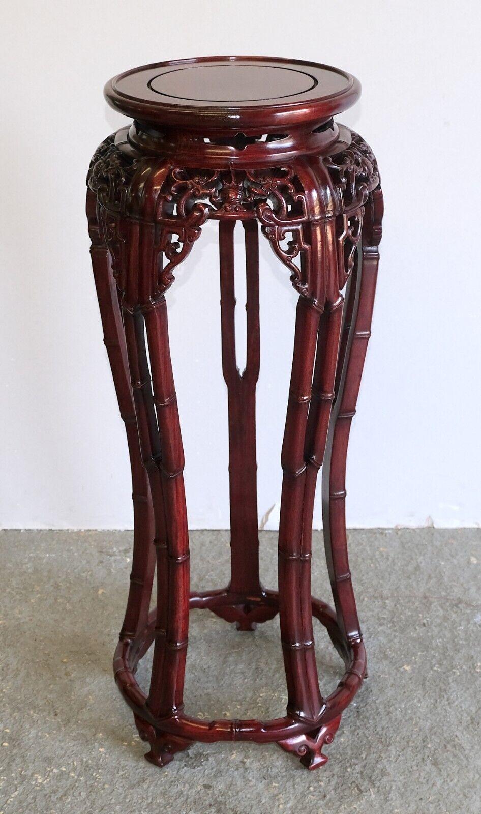 We are delighted to offer for sale this stunning hand carved Chinese dragons theme hardwood plant stand round top. 

This solid and eye catching piece is just stunning from any point of view. Under the top and all around shows the nicely carved