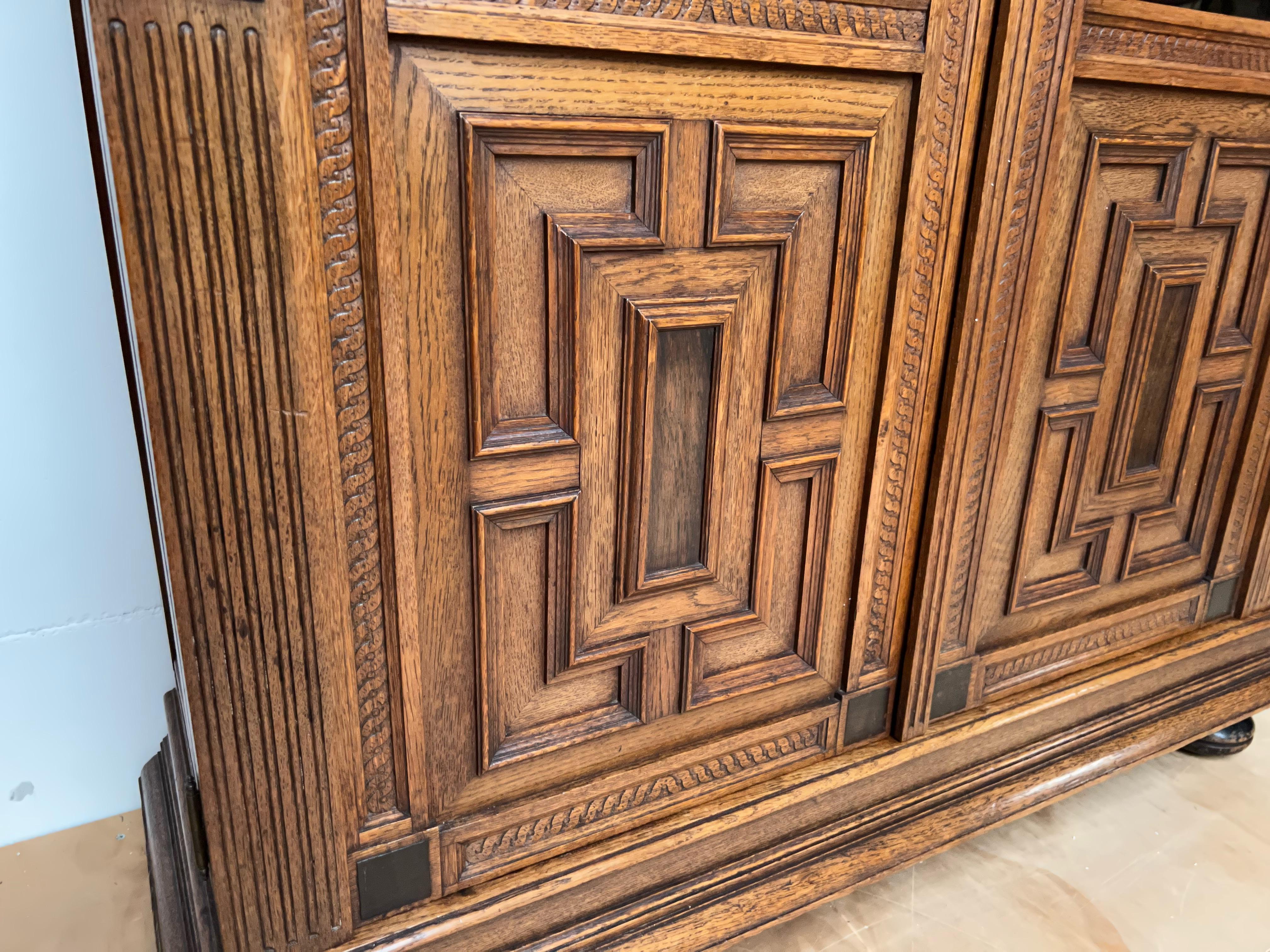 Stunning Hand Carved Dutch Renaisssance Oak Bookcase / Cabinet w. Glass Windows For Sale 9