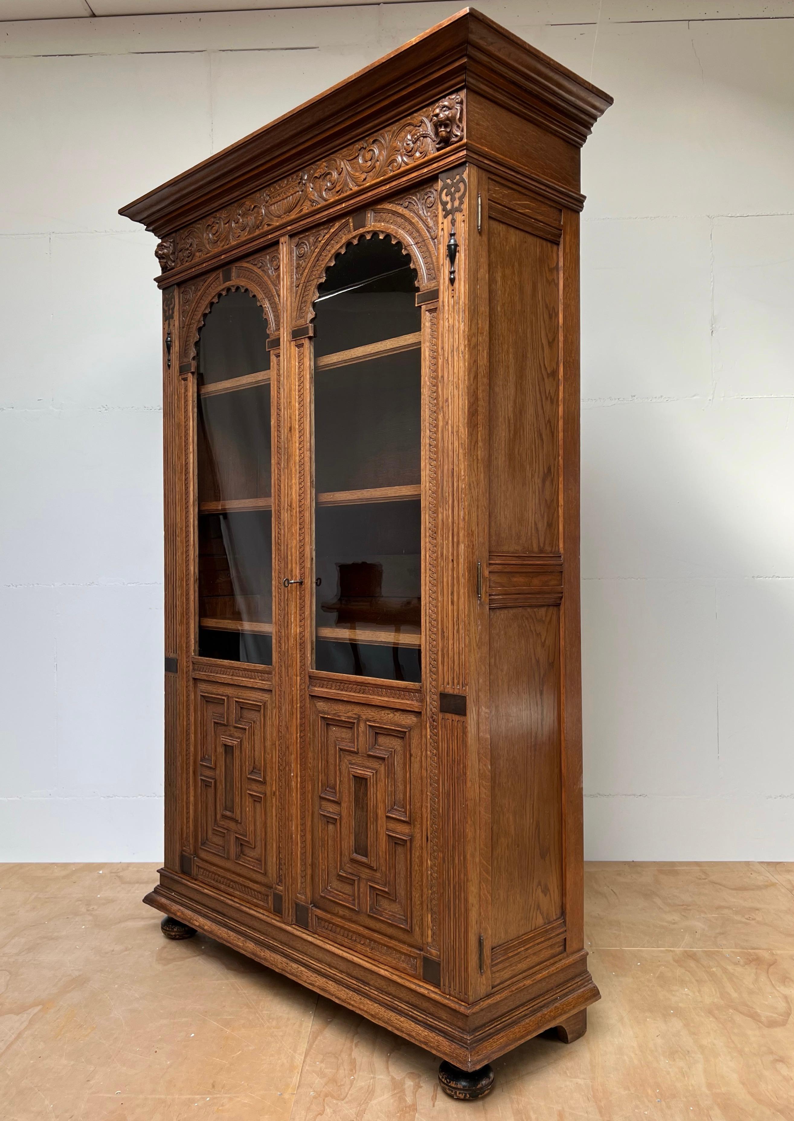Solid oak Renaissance Revival bookcase with superbly hand carved decorations.

If you are familiar with style elements of the Renaissance era then you will immedidately recognize this practical size bookcase as a Renaissance Revival antique. In