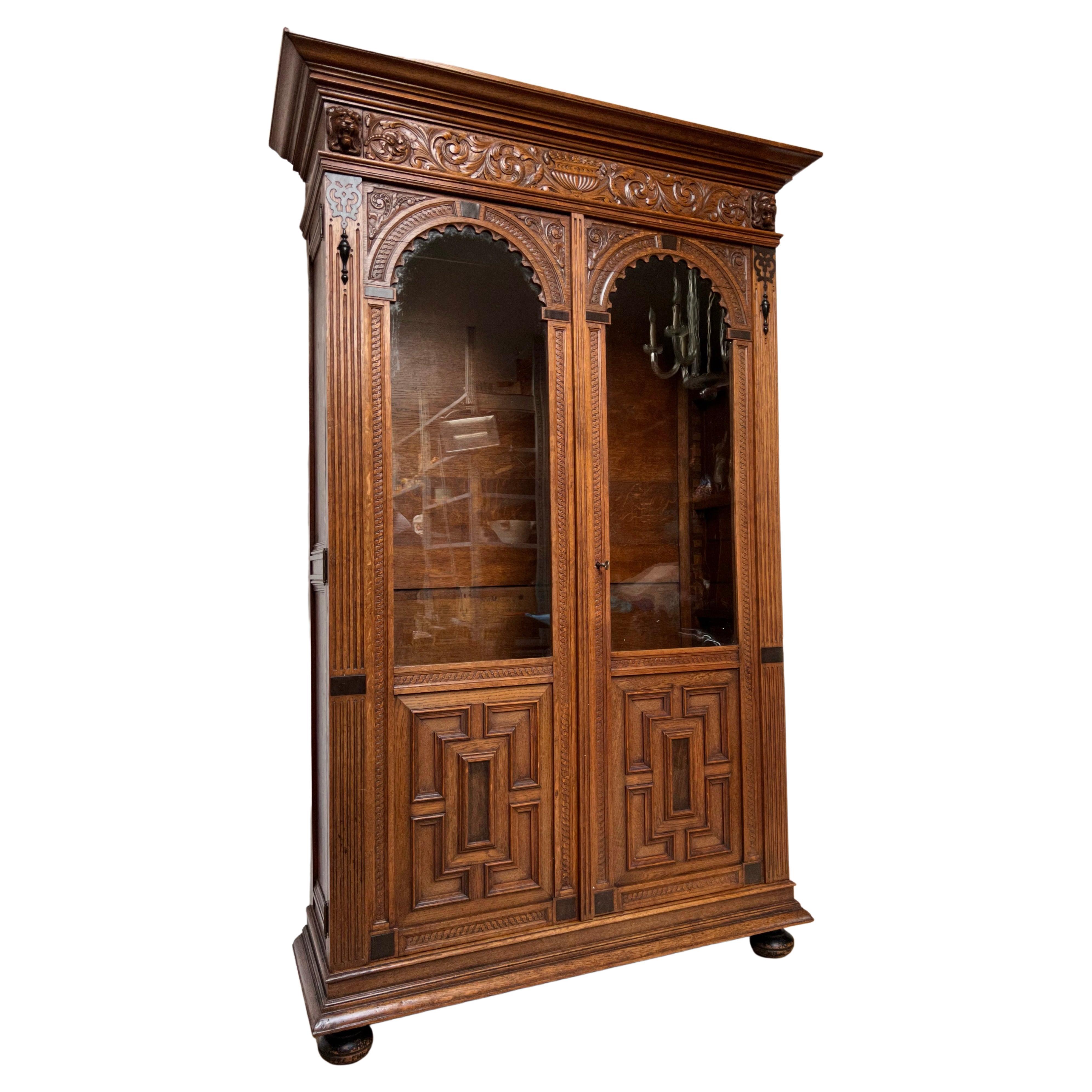 Stunning Hand Carved Dutch Renaisssance Oak Bookcase / Cabinet w. Glass Windows For Sale