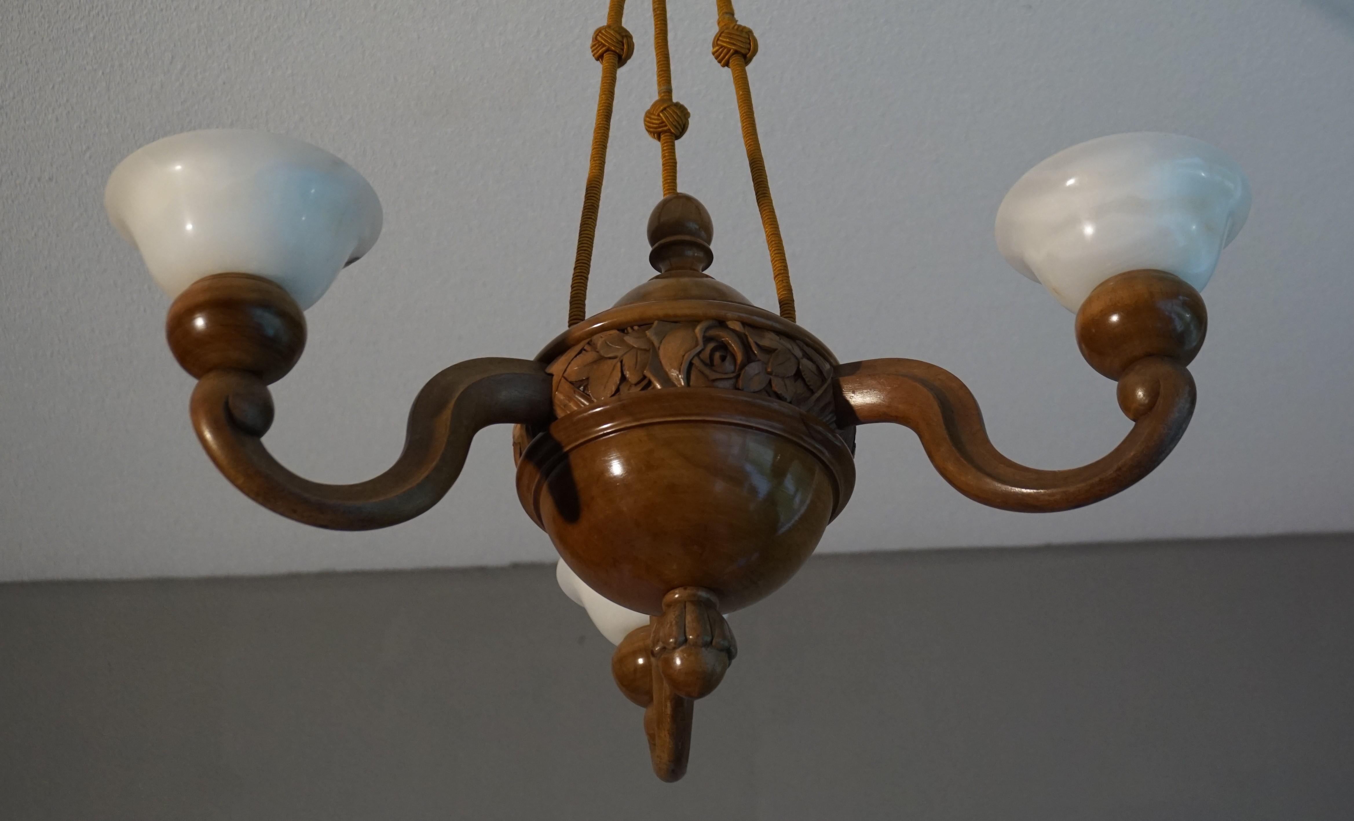 Stunning Hand Carved Nutwood and Alabaster Art Deco Pendant Light / Chandelier In Excellent Condition For Sale In Lisse, NL
