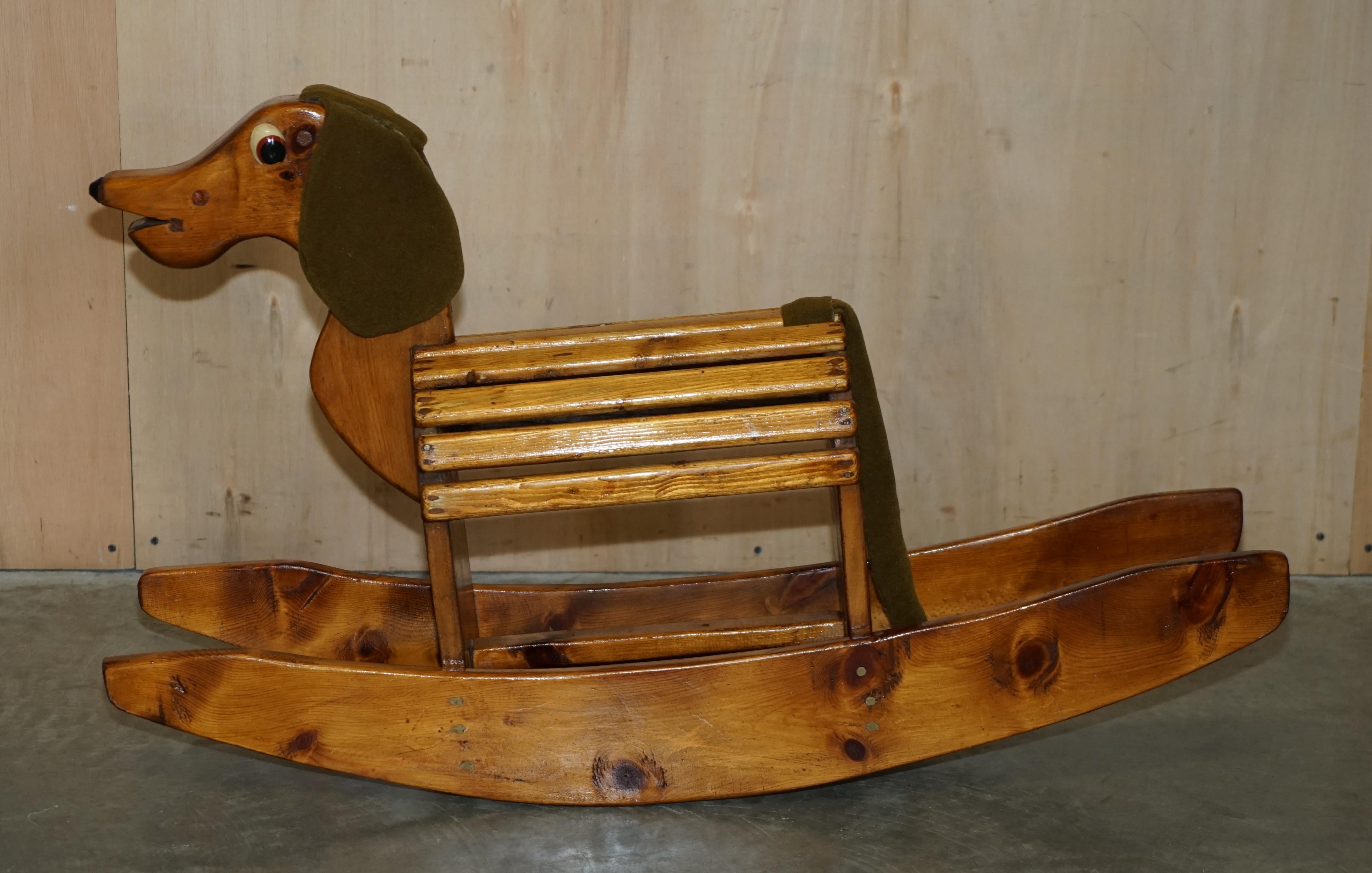 We are delighted to offer for sale this one of a kind hand made in England rocking horse in the form of a Sausage dog.

What a charming period piece of children’s folk art. I have never seen another rocking horse sausage dog before, it just