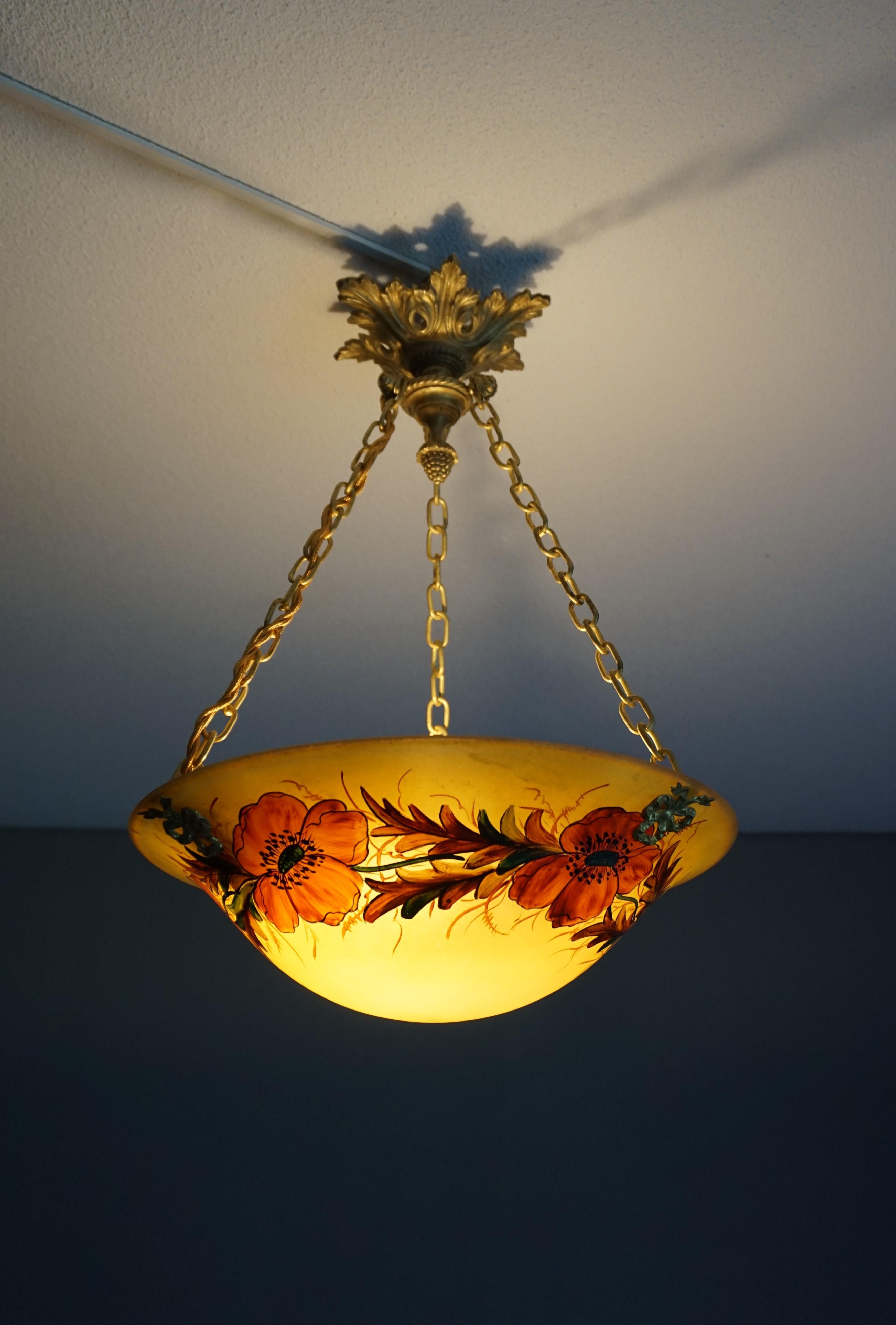 Marvellously hand painted poppy flowers pendant by Leune.

With early 20th century lighting being one of our specialities, we always get excited when we find a light fixture that we have never seen before. We loved this fixture when we first saw it