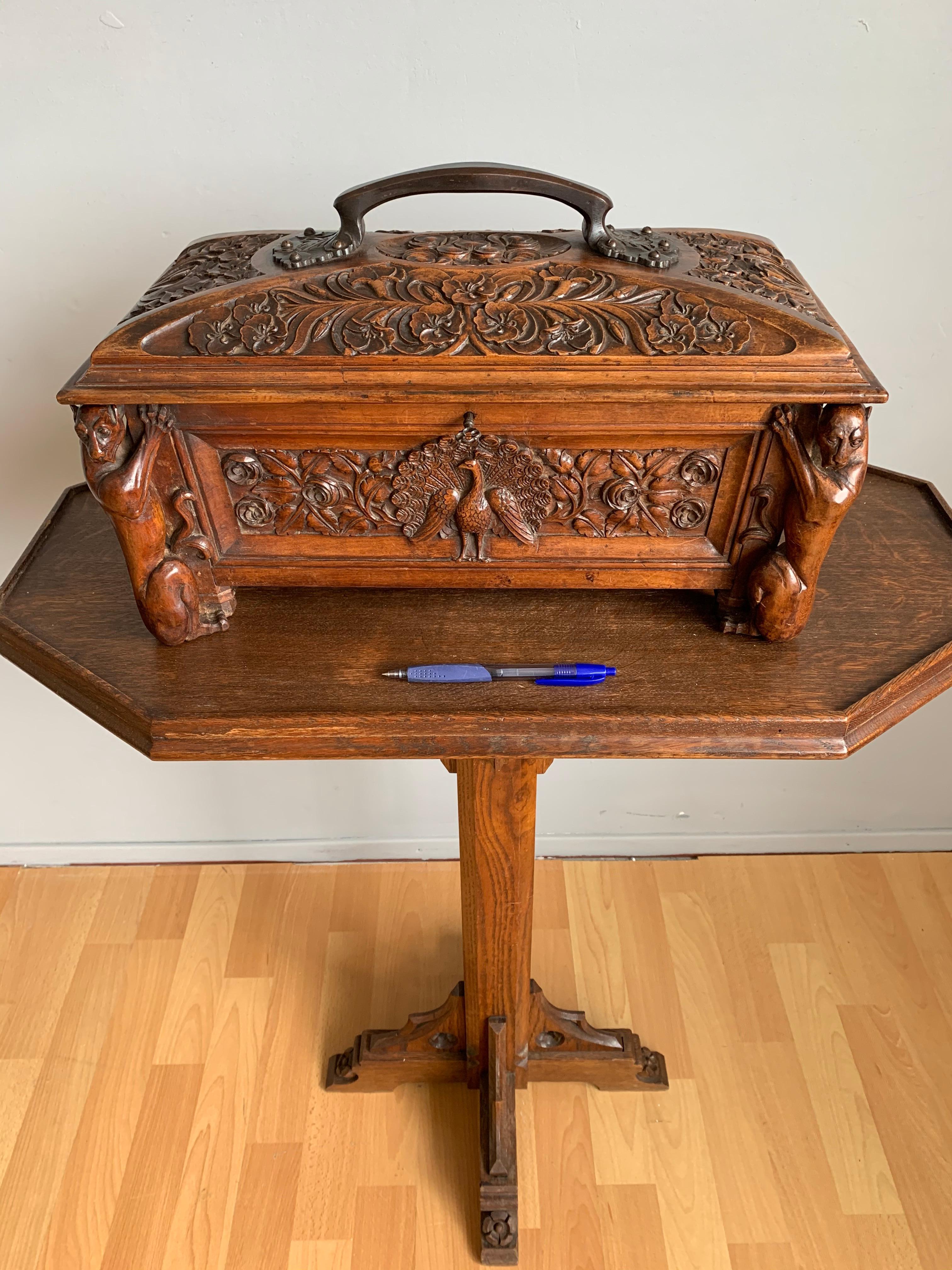 Beautiful and rare Gothic Revival treasure box with bronze handle.

If you are a collector of antique boxes and/or if you are looking for an extraordinary jewelry box to grace your credenza or side table then this unique and top quality made