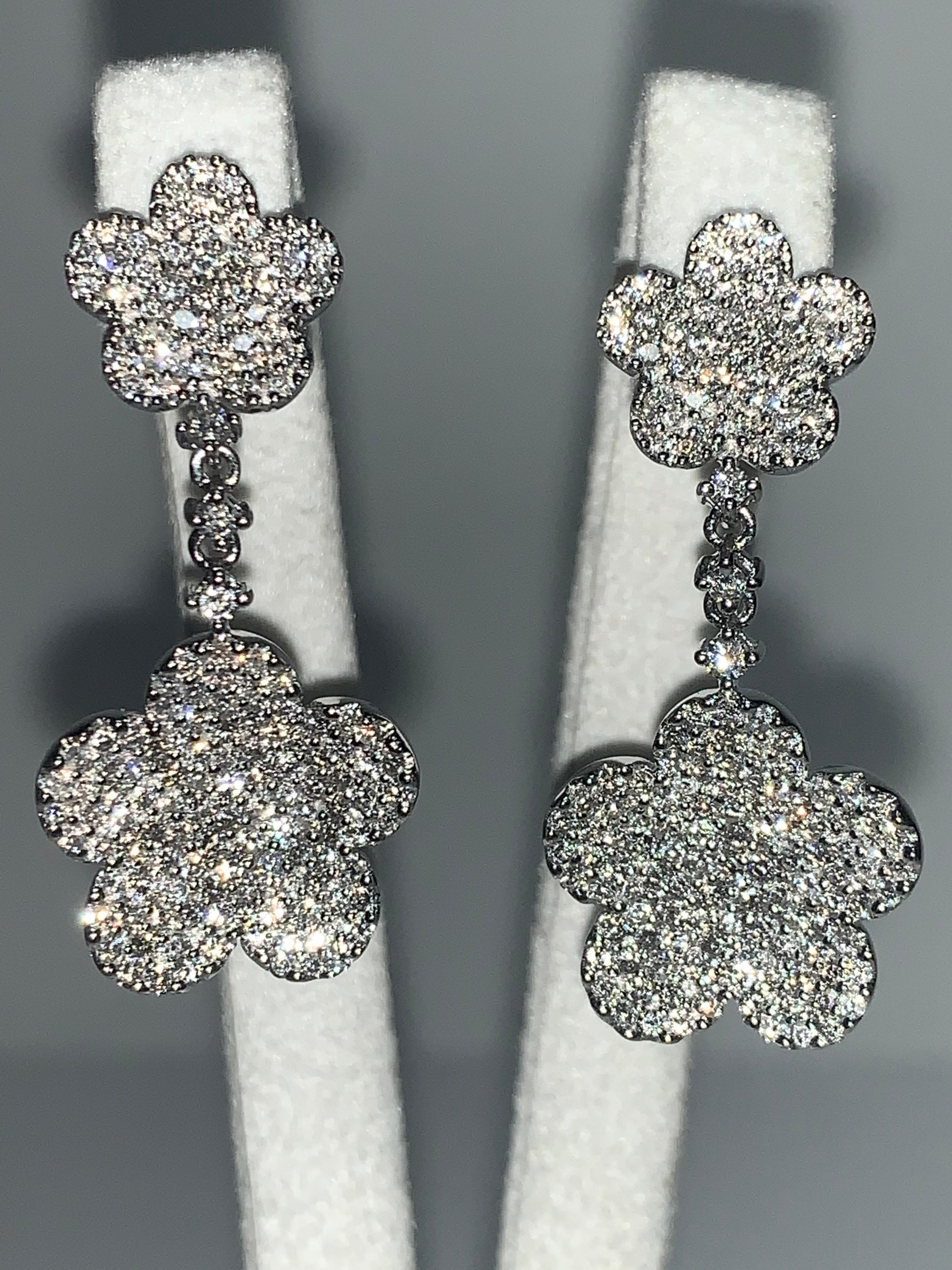 Stunning Handcrafted one-of-a-kind 18K White Gold Diamond Double Flower Earrings. Edgy attention-getting earrings that you will love wearing to your favorite events.
18K White Gold
Handmade
2.24 Carat White Diamonds

We specialize in unique,