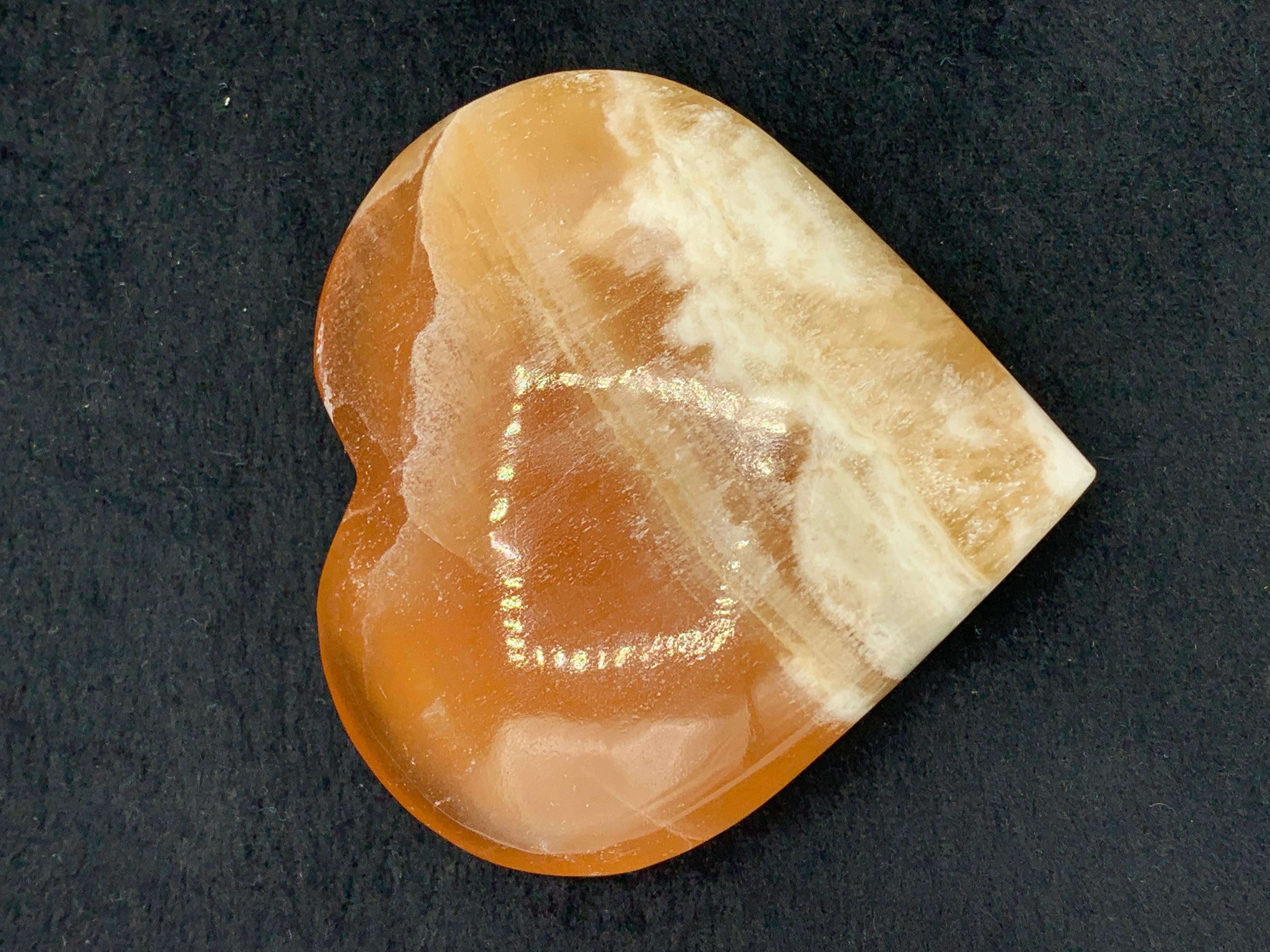 PRODUCT INFORMATION:

Specimen Type: Honey Calcite Crystal
Weight: 248 Gram
Dimension: H: 7.8 x W: 7.9 x D: 2 Cm
Origin: Pakistan 
Treatment: None

DESCRIPTION:

Presenting the warmth and beauty of this heart shaped Honey Calcite crystal. Radiating