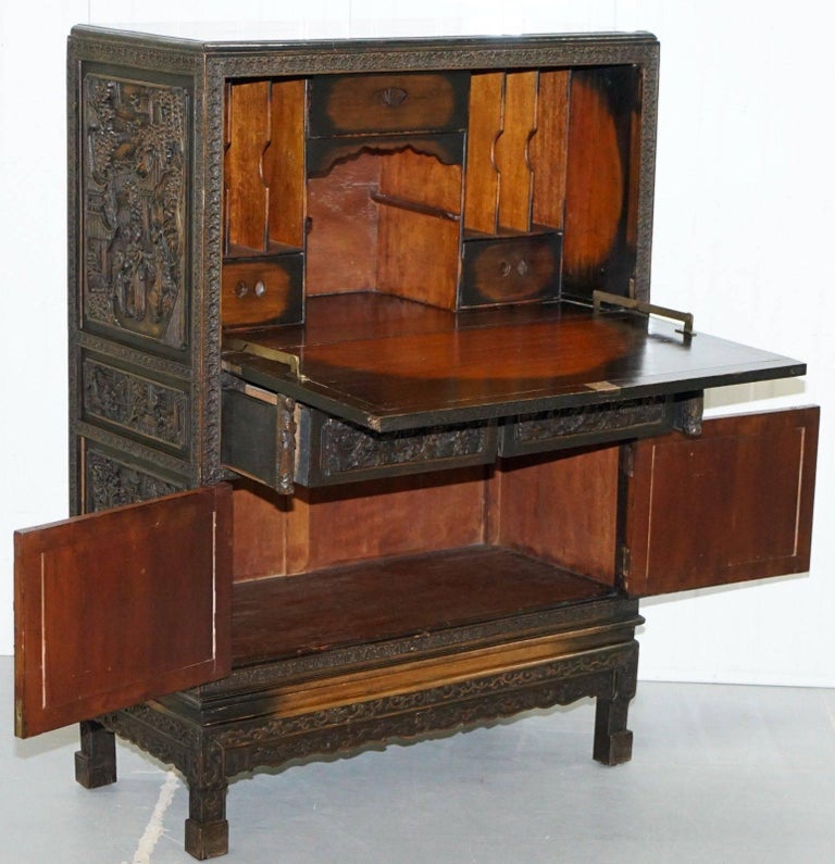 Stunning Heavily Carved Antique Chinese Cupboard with Drop