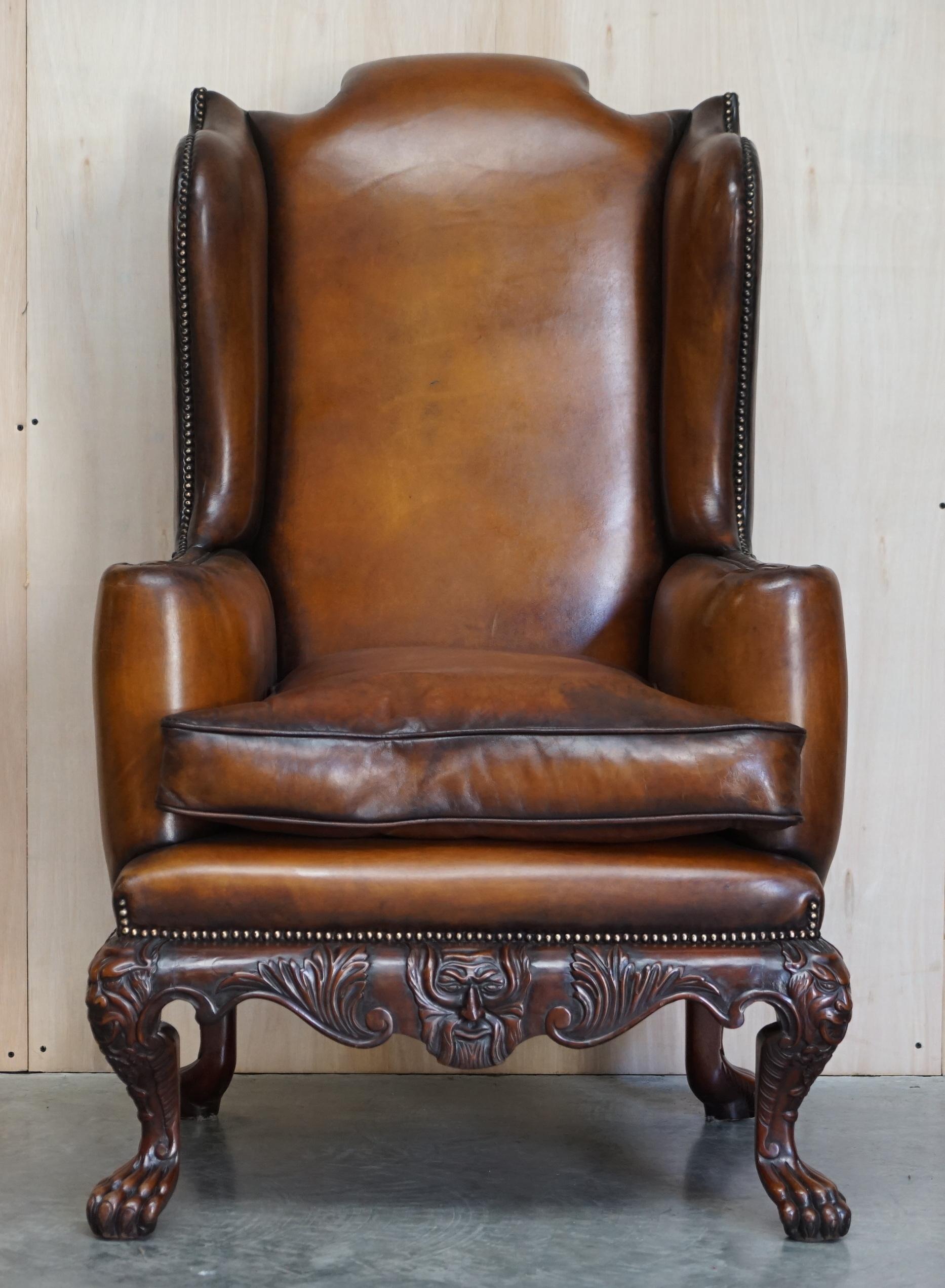 We are delighted to offer for sale this exquisite, heavily carved oversized wingback armchair with stunning base frame depicting lions hairy paw feet

This is a real wow piece, the chair is much larger than normal, it has William Morris type flat