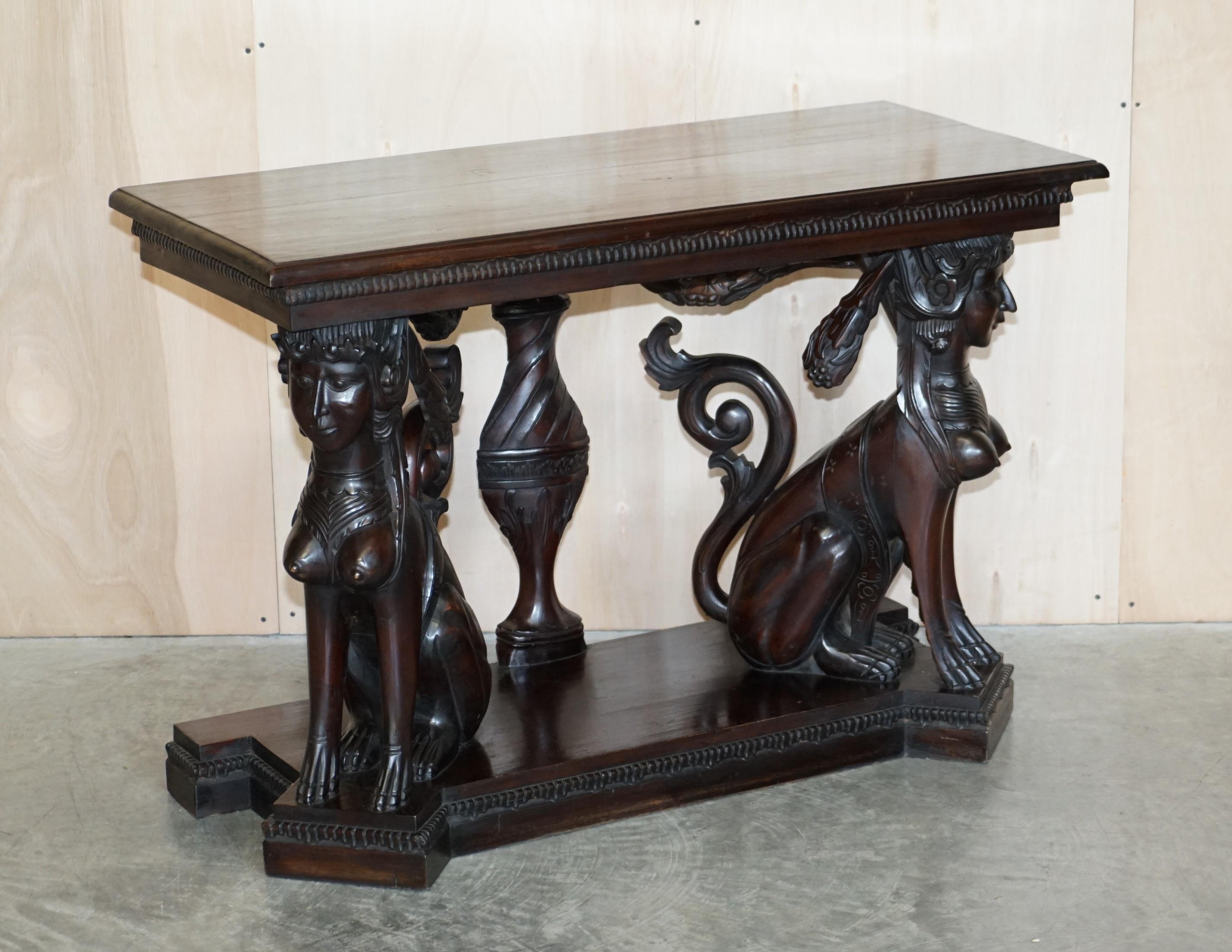 We are delighted to offer for sale this very decorative, heavily carved, Egyptian Revival console table with twin Sphinx pillards.

A very good looking and expertly crafted piece, if your looking for pure art furniture then look no further, this