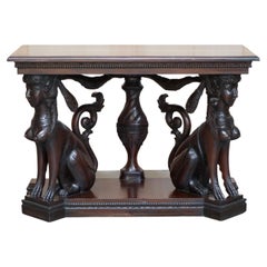 Stunning Heavily Carved Egyptian Revival Console Table with Twin Sphinx Pillars