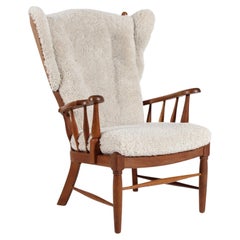 Stunning Henning Kjærnulf Style High Back Armchair of Solid Oak Denmark 1970s