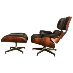 Superbe fauteuil de salon et pouf Eames Herman Miller
