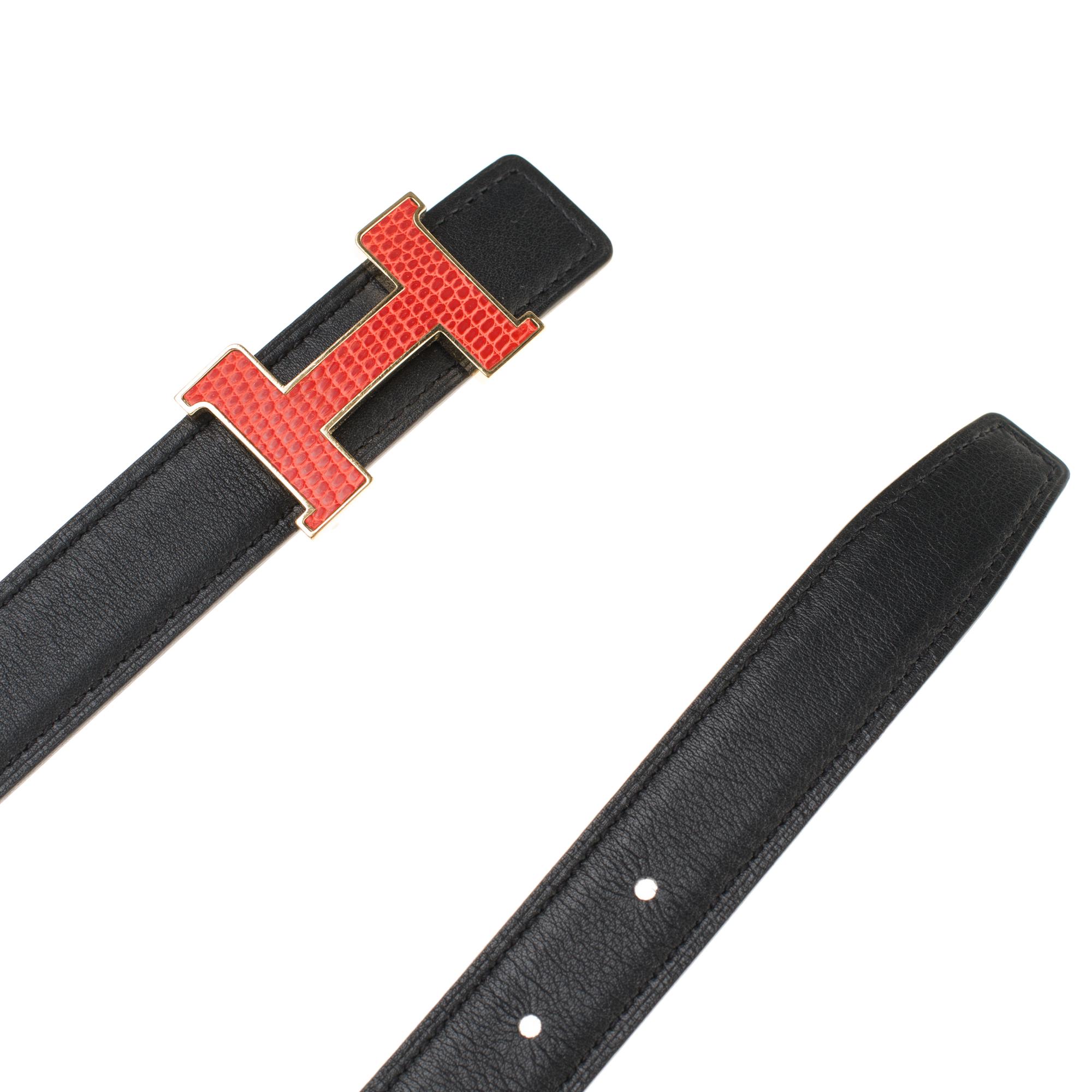 Amazing Hermès Reverse belt in black swift leather and étoupe epsom.
Gold plated metal buckle with red/orange lizard.
Signature: 