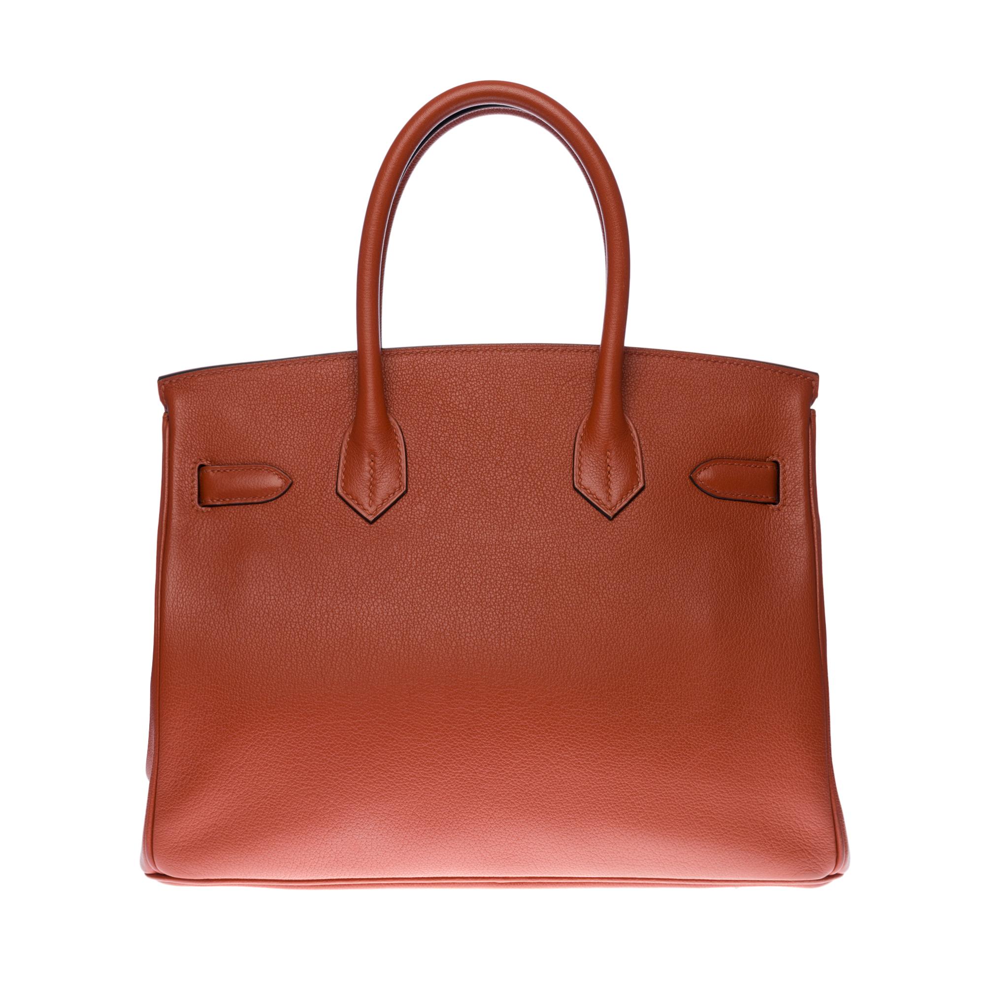 Beautiful Hermes Birkin 30 cm handbag in Mysore Goat Cuivre (goat leather is known for its sturdiness and lightness), Palladium silver metal hardware, double copper leather handle allowing a hand carry

Flap closure
Inner lining in copper leather,