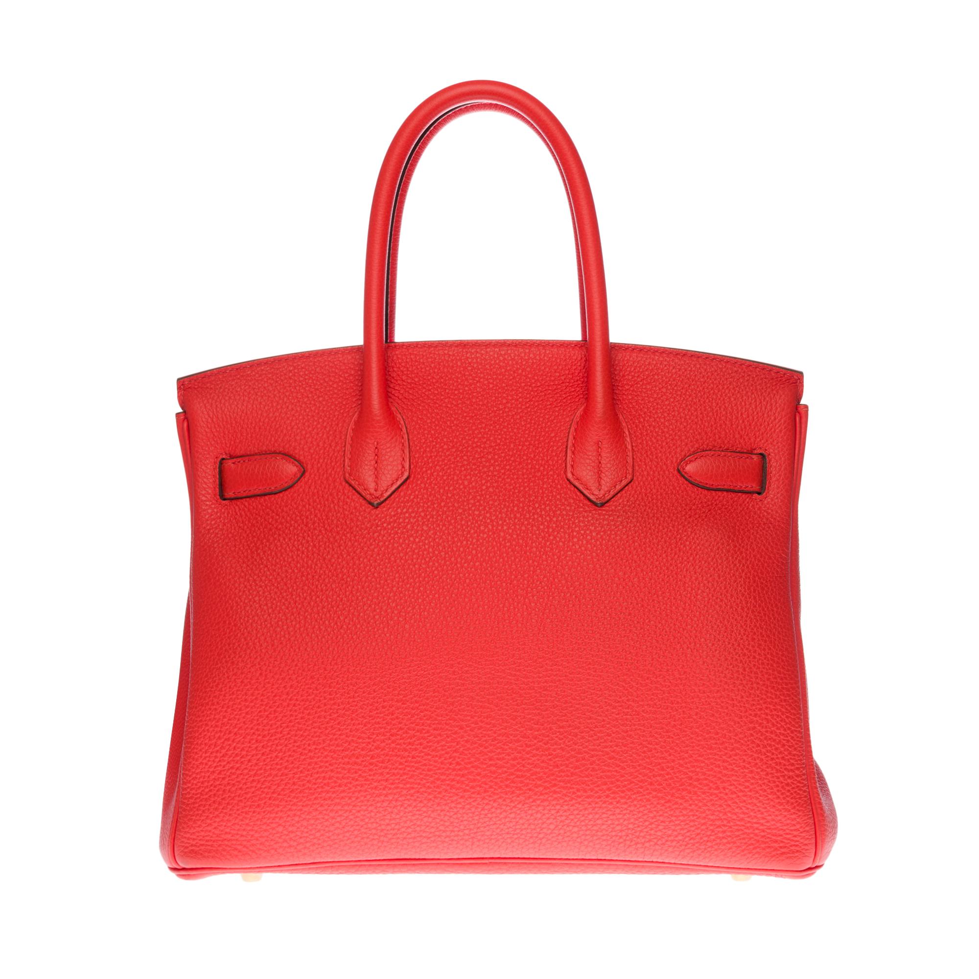 Beautiful Hermes Birkin 30 handbag in red Togo Capuchin leather, gold-plated metal hardware, double handle in red leather allowing a handheld
Flap closure
Lining in red H leather, one zip pocket, one patch pocket
Signature: 