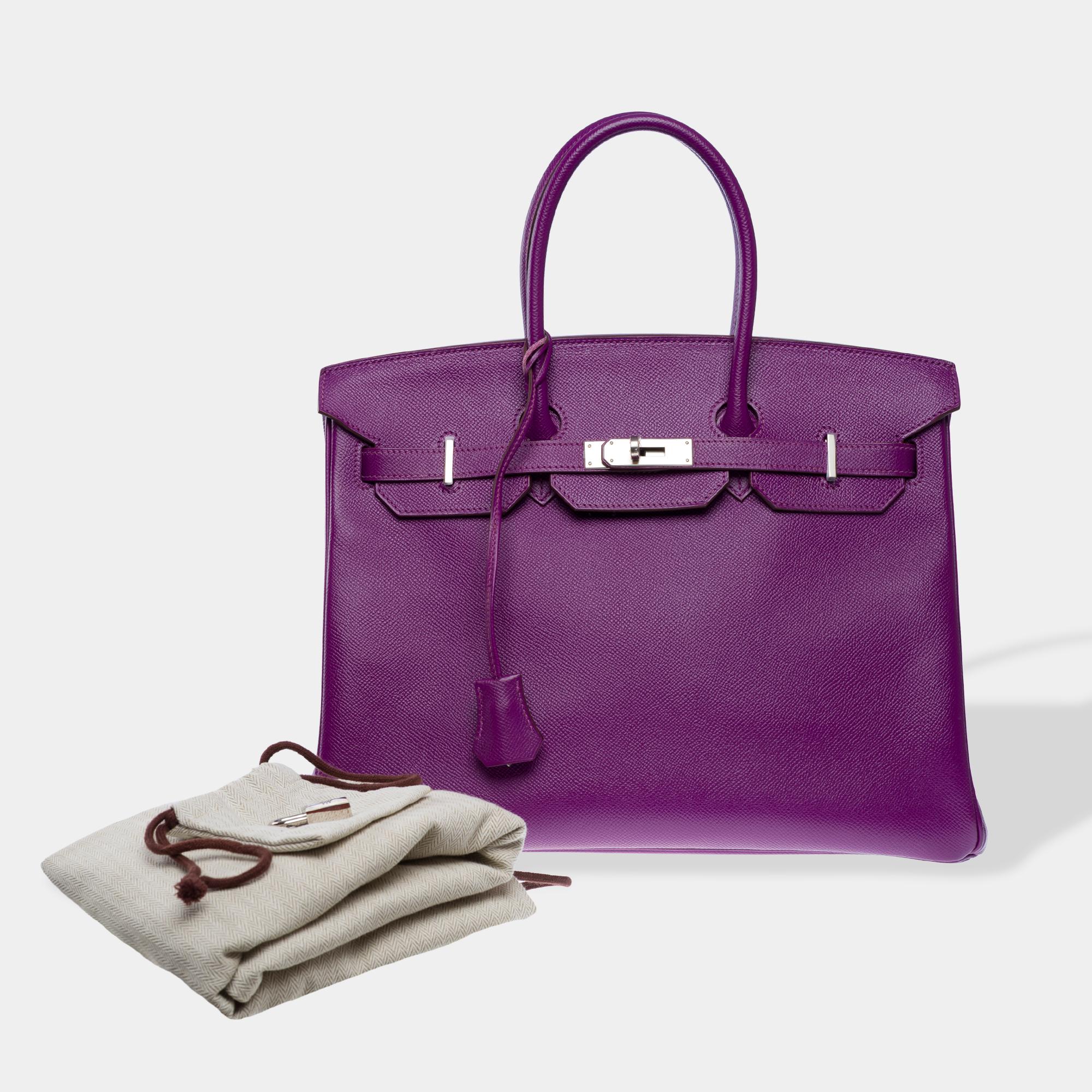 Stunning​ ​and​ ​Bright​ ​Hermes​ ​Birkin​ ​35​ ​handbag​ ​in​ ​Anemone​ ​Epsom​ ​calf​ ​leather,​ ​silver​ ​palladium​ ​metal​ ​trim,​ ​double​ ​purple​ ​leather​ ​handles​ ​for​ ​hand​ ​carry

Closure​ ​with​ ​flap
Interior​ ​lining​ ​in​ ​purple​