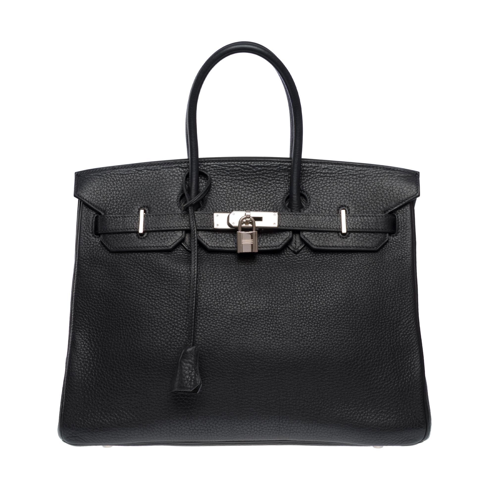 Splendid​ ​Hermes​ ​Birkin​ ​35​ ​handbag​ ​in​ ​black​ ​Taurillon​ ​Clémence​ ​leather,​ ​palladium​ ​silver​ ​trim,​ ​double​ ​black​ ​leather​ ​handle​ ​for​ ​carrying​ ​by​ ​hand

Flap​ ​closure
Lining​ ​Black​ ​leather​ ​interior,​ ​one​