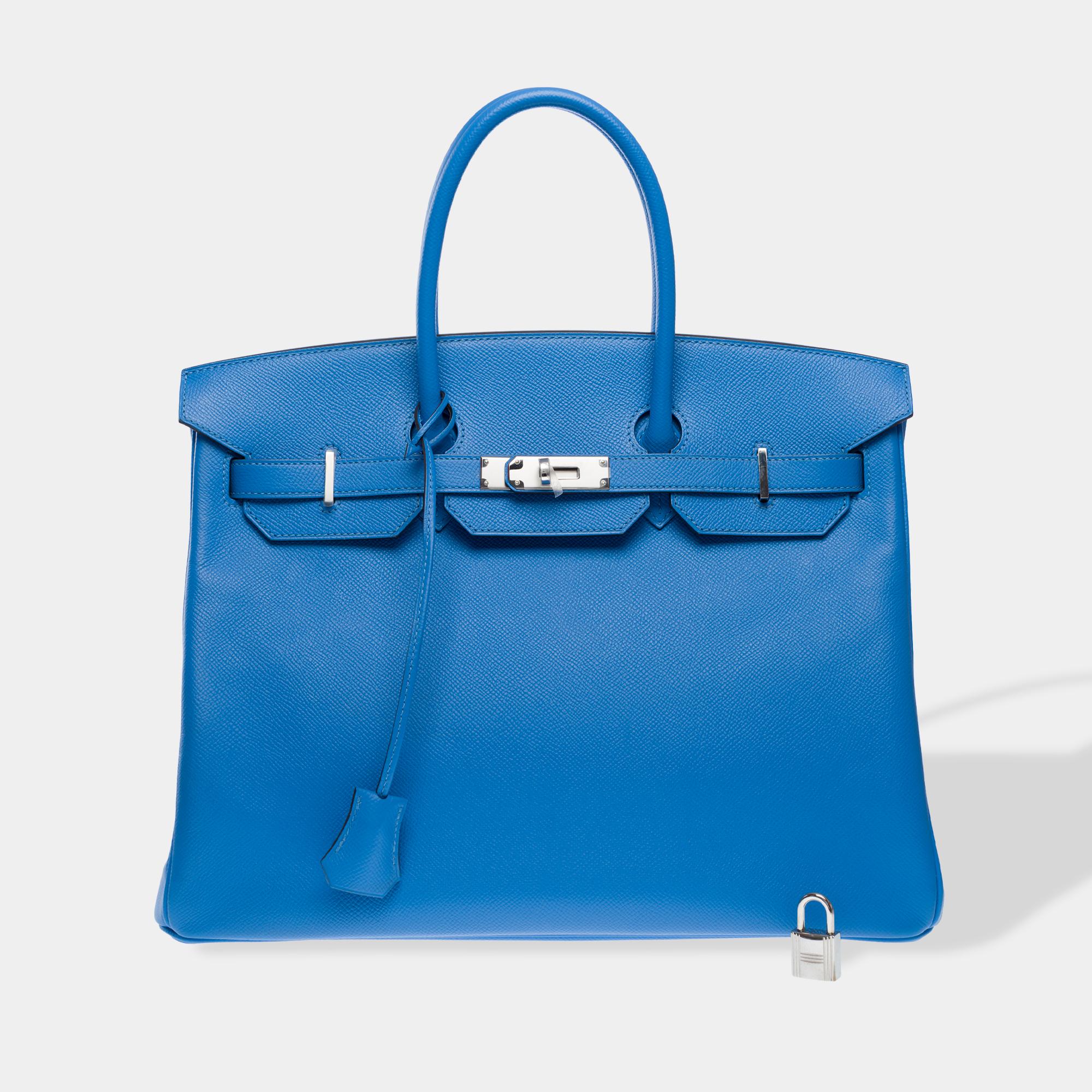 Stunning​ ​and​ ​Bright​ ​Hermes​ ​Birkin​ ​35​ ​handbag​ ​in​ ​Blue​ ​Paradis​ ​Epsom​ ​calf​ ​leather,​ ​silver​ ​palladium​ ​metal​ ​trim,​ ​double​ ​blue​ ​leather​ ​handles​ ​for​ ​hand​ ​carry

Closure​ ​with​ ​flap
Interior​ ​lining​ ​in​