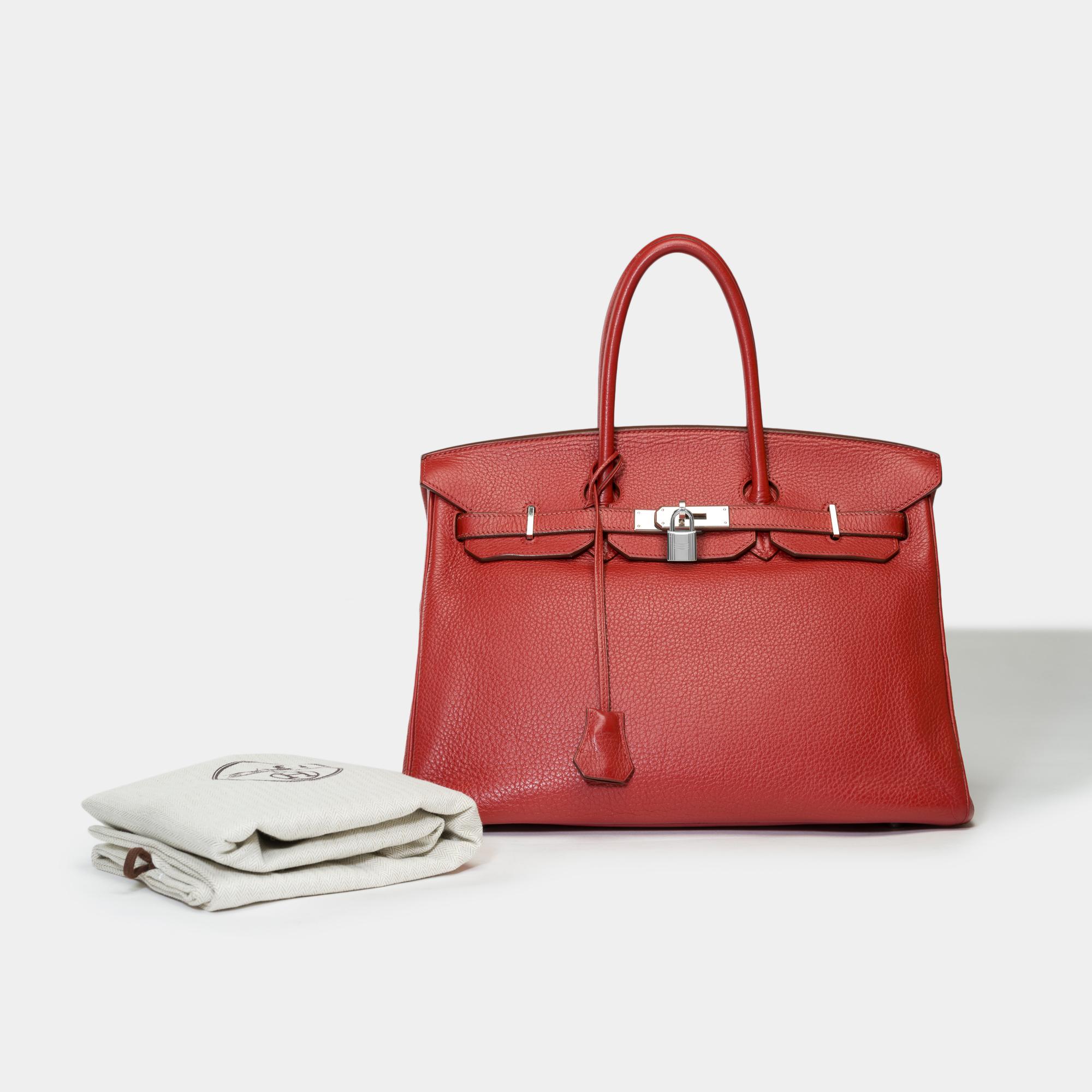 Stunning​ ​Hermès​ ​Birkin​ ​35​ ​in​ ​Sienne ​Togo​ ​leather,​ ​palladium​ ​silver​ ​metal​ ​trim​ ​,​ ​​ ​double​ ​handle​ ​in​ ​red​ ​leather​ ​allowing​ ​a​ ​hand​ ​carry

Flap​ ​closure
Red​ ​leather​ ​inner​ ​lining​ ​,​ ​a​ ​zippered​
