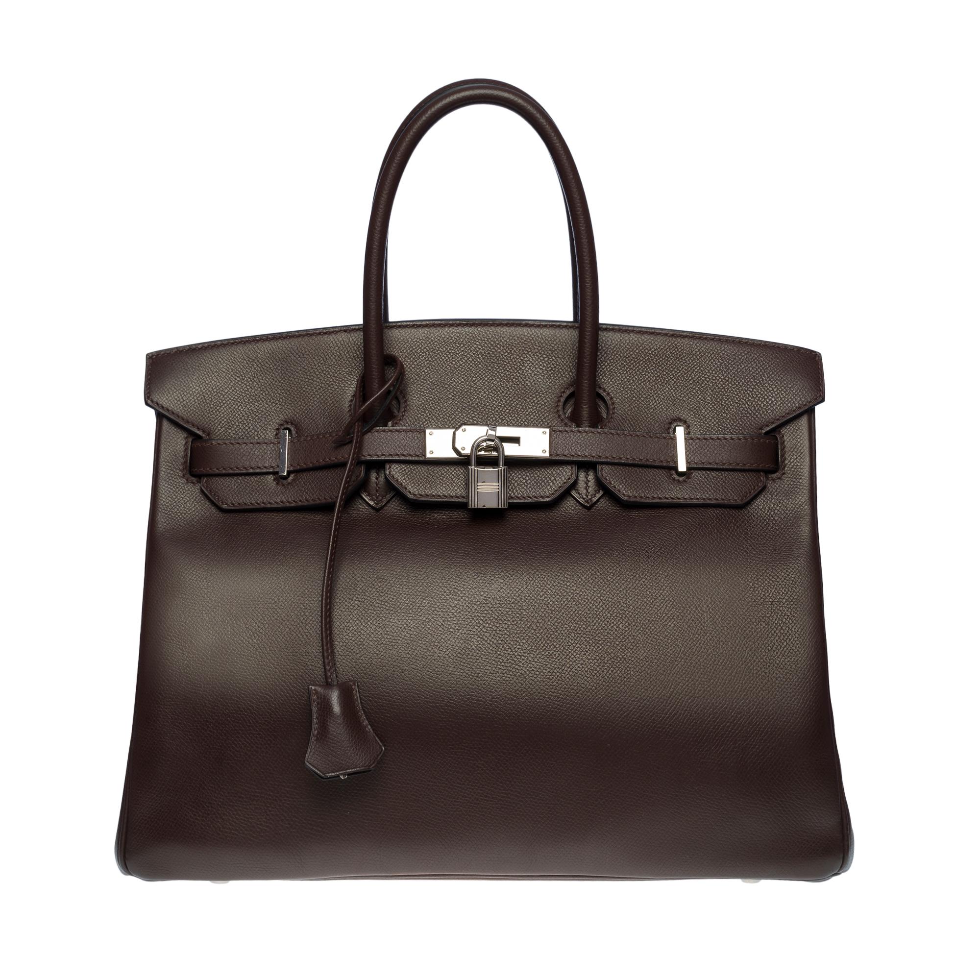 Beautiful Hermes Birkin 35 handbag in brown Epsom leather, palladium silver metal hardware, double brown leather handle allowing a hand-carry

Flap closure
Inner lining in brown leather, one zippered pocket, one patch pocket
Signature: 