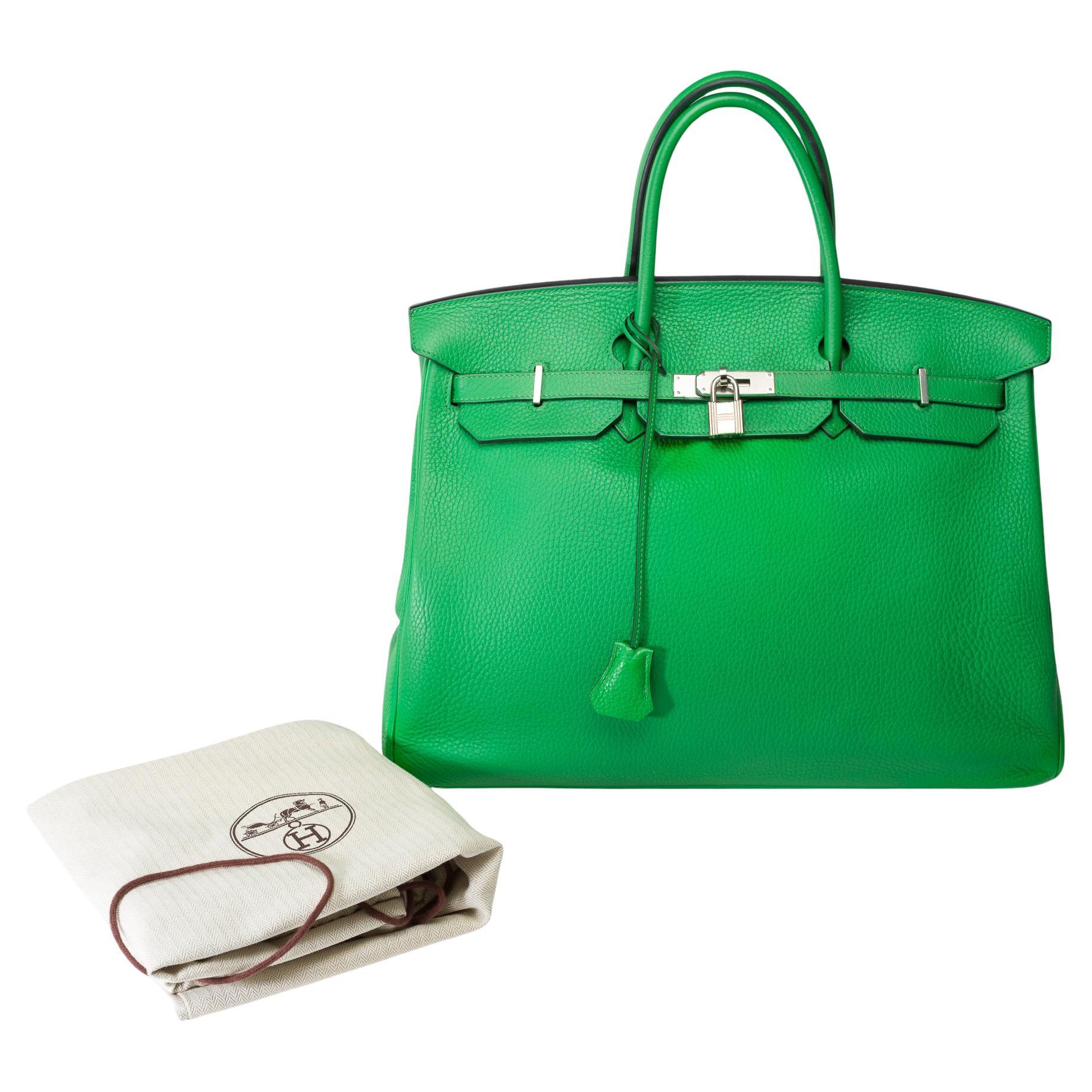 Beautiful​ ​and​ ​very​ ​sought​ ​after​ ​Hermes​ ​Birkin​ ​40​ ​handbag​ ​in​ ​Green​ ​Bamboo​ ​Togo​ ​leather​ ​,​ ​palladium​ ​silver​ ​metal​ ​trim,​ ​double​ ​handle​ ​in​ ​green​ ​leather​ ​allowing​ ​a​ ​hand​ ​carry

Flap​ ​closure
Green​