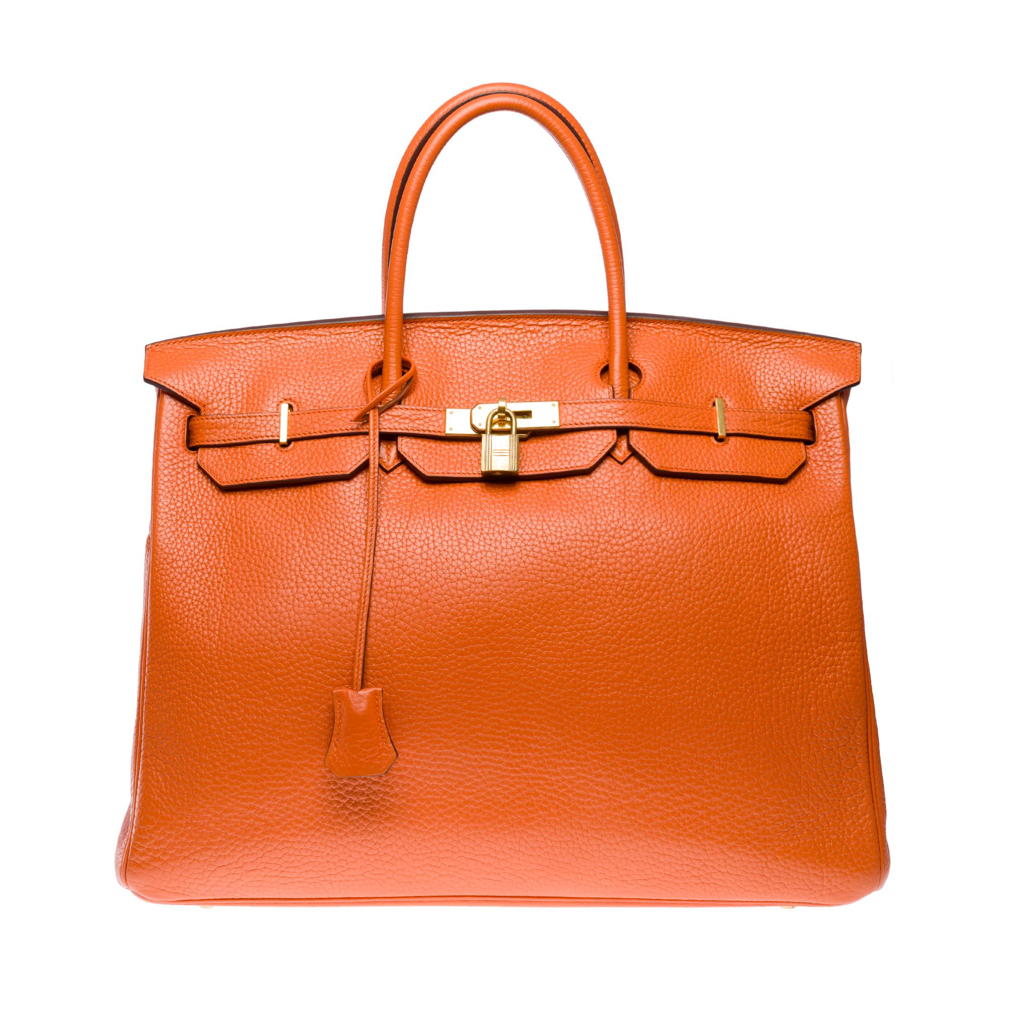 Splendid​ ​&​ ​Bright​ ​Birkin​ ​40​ ​handbag​ ​in​ ​orange​ ​H​ ​Togo​ ​leather​ ​,​ ​gold-plated​ ​metal​ ​trim,​ ​double​ ​orange​ ​leather​ ​handle​ ​for​ ​a​ ​hand​ ​carry

Flap​ ​closure
Orange​ ​leather​ ​inner​ ​lining,​ ​one​ ​zipped​