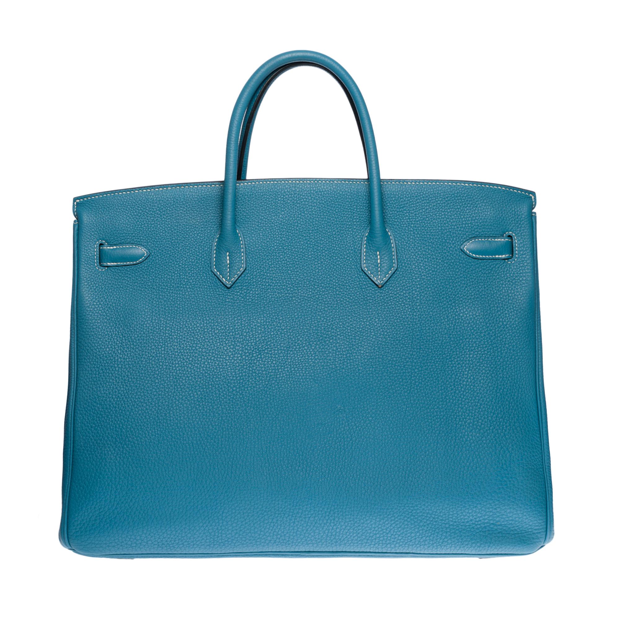 Beautiful Hermes Birkin 40 cm Leather Blue Togo Jeans with White Stitching, Palladium Silver Metal hardware, Double Blue Leather Handle for Hand Wear

Flap closure
Inner lining in blue leather, one zippered pocket, one patch pocket
Signature: