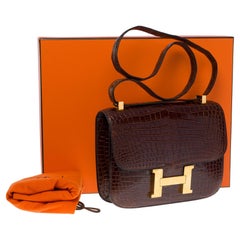 Superbe sac à bandoulière Hermès Constance en cuir Crocodile Porosus brun, GHW