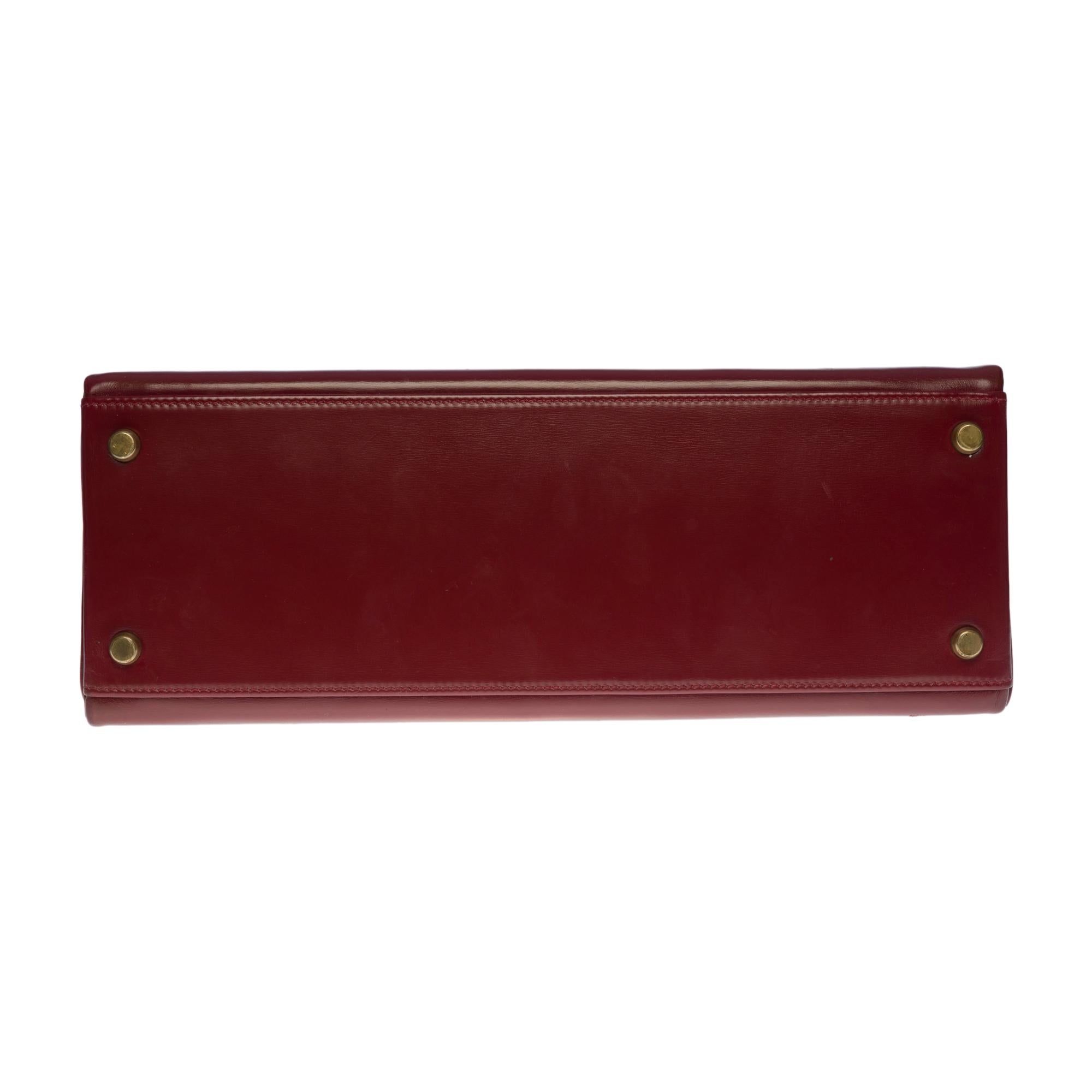Stunning Hermès Kelly 32 handbag in Burgundy Calf box leather, GHW 2