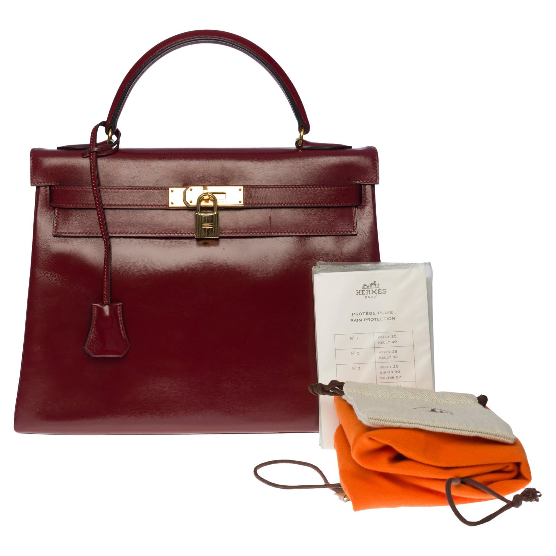 Stunning Herm�ès Kelly 32 handbag in Burgundy Calf box leather, GHW