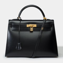 Stunning Hermès Kelly 32 sellier handbag strap in Black Box Calf leather, GHW