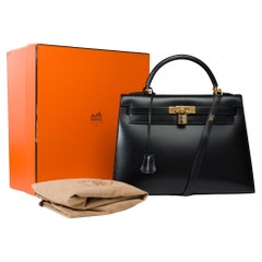 Superbe sac à main Hermès Kelly 32 sellier en cuir de veau Box noir, GHW