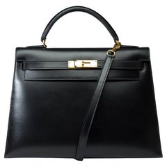 Stunning Hermès Kelly 32 sellier handbag strap in Black Box Calf leather, GHW