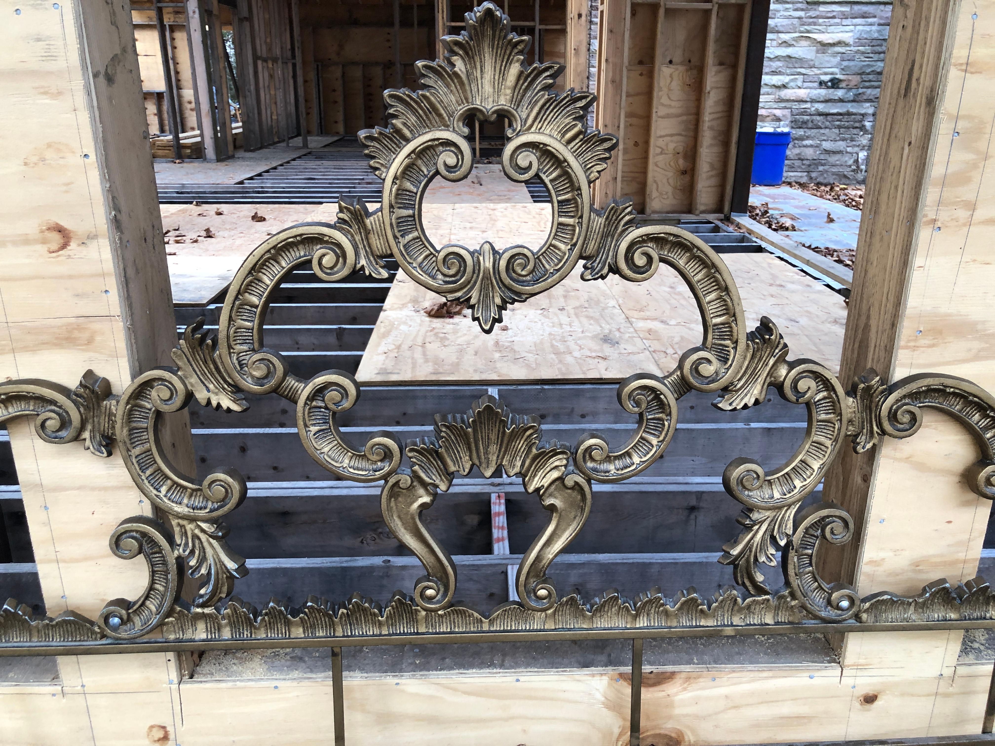 Fabulous Hollywood Regency ornate cast metal gilded gold king-size headboard. This piece is in fantastic original condition and is ready to slip right in to your glamorous boudoir. It measures 54