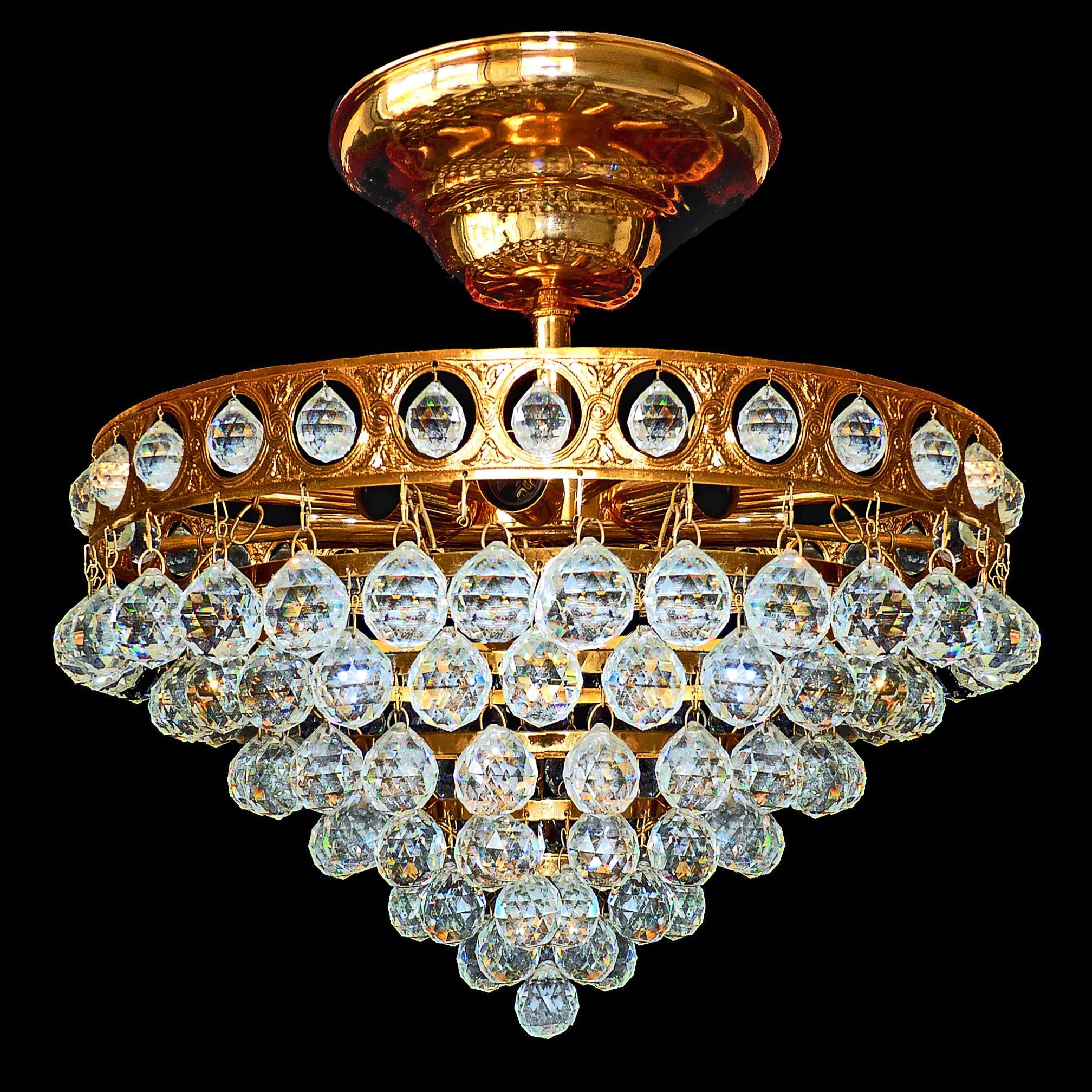 Stunning vintage high quality gold-plated chandelier. Large, heavy with 156 multifaceted Swarovski crystal balls in seven-tiers.
From a collection of a luxury hotel in Lisbon/Portugal
Eight light bulbs / good working condition
Weight 26 lb. (12