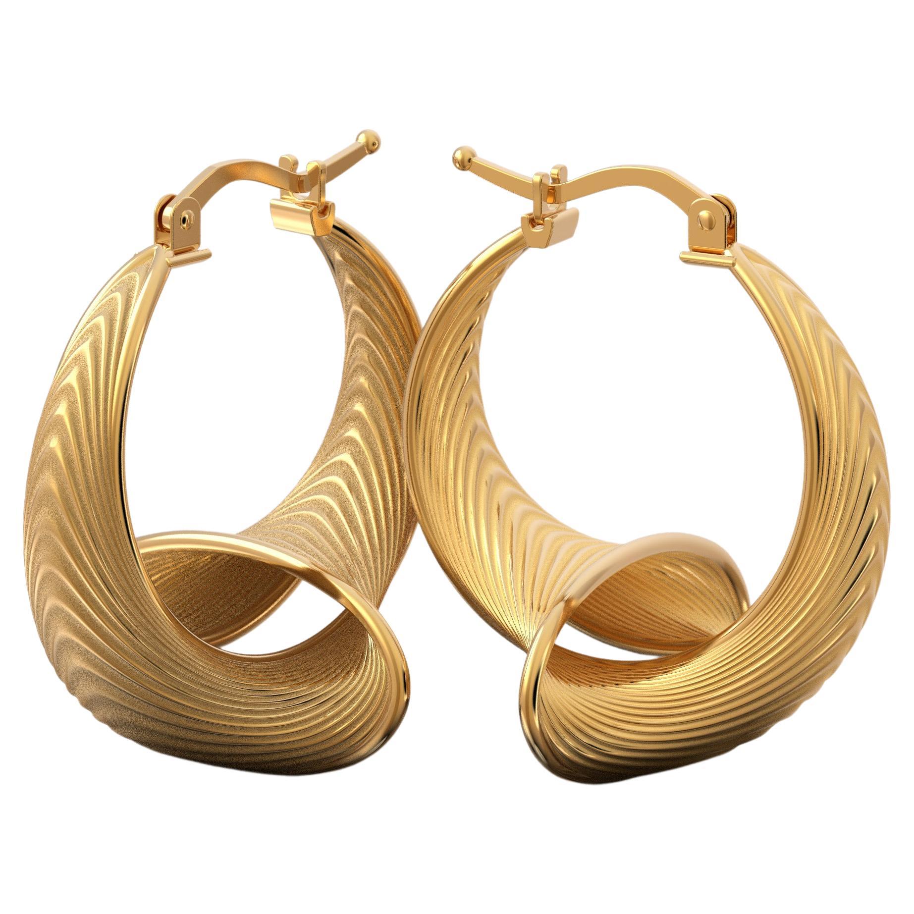 Elevate your style with our 24 mm Diameter Hoop Earrings in 14k Gold, a harmonious blend of Italian craftsmanship and modern innovation. These captivating earrings boast a striking fusion of classic beauty and futuristic design, handcrafted in