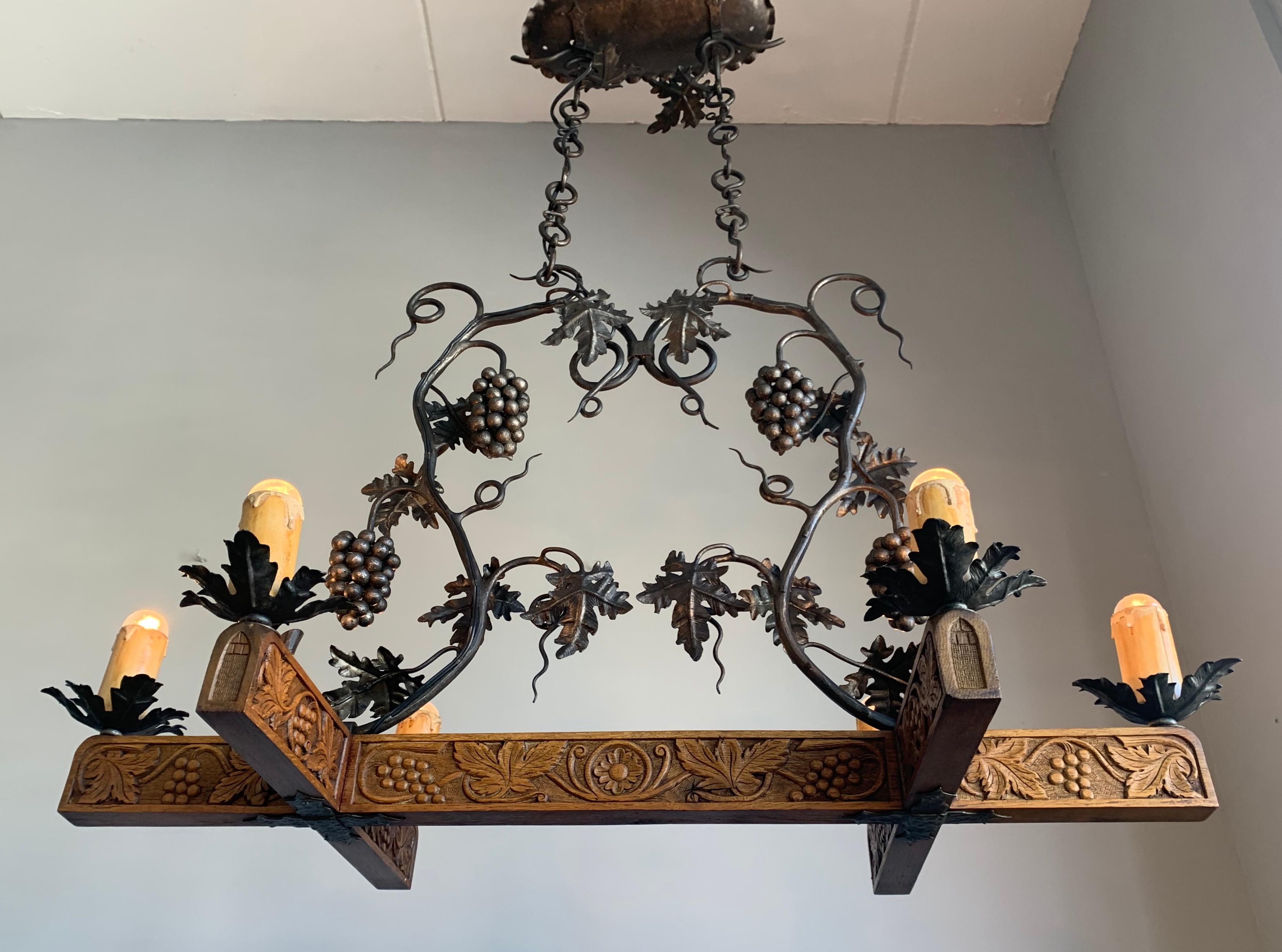 Rare and remarkable, wine theme Arts & Crafts work of lighting art.

The top quality craftsmanship that was put into this very well designed and amazingly decorative chandelier makes it the eyecatcher that she is. It is antique chandeliers like this