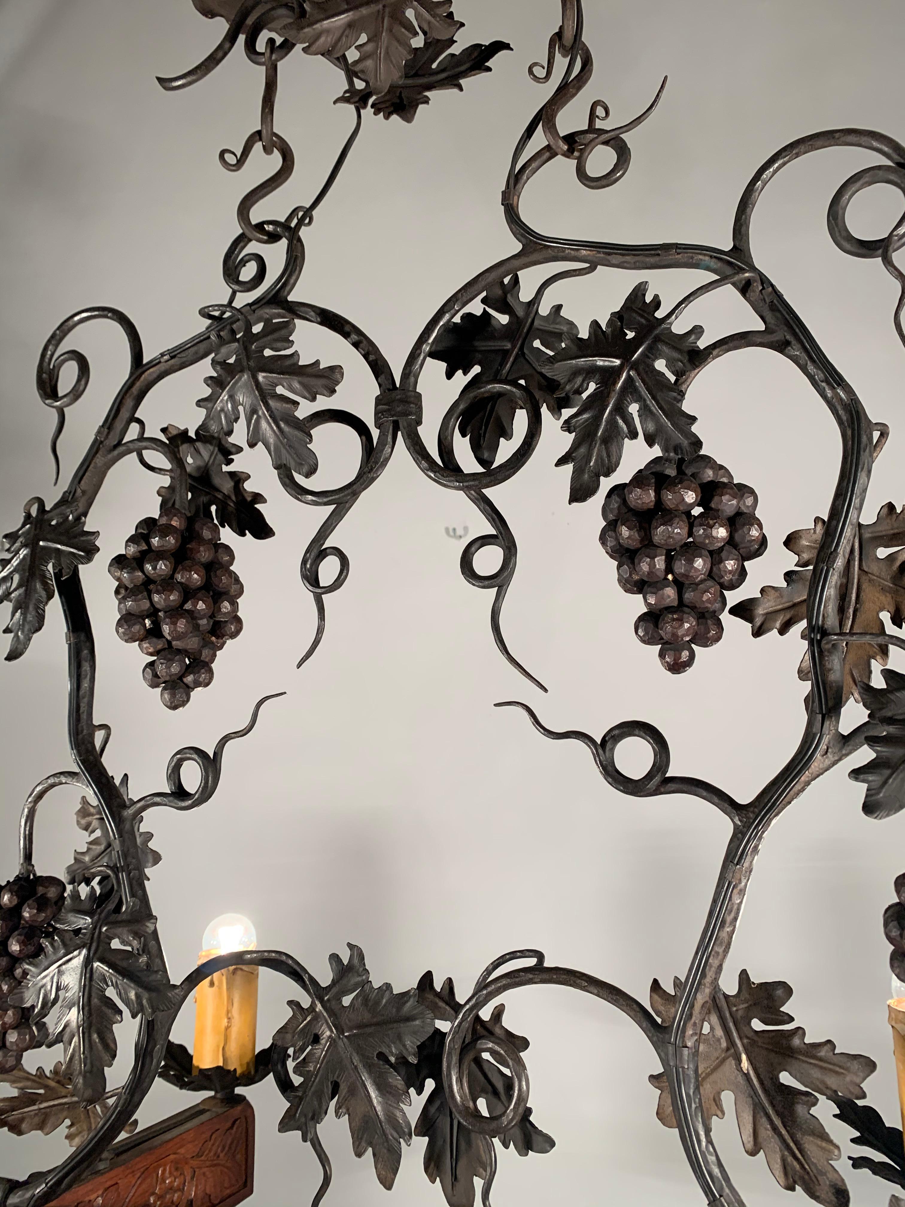Hand-Carved Stunning Horizontal Chandelier with Wrought Iron Grapes and Hand Carved Branches For Sale