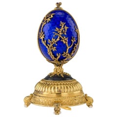 Superbe œuf musical Oiseau de feu en argent massif plaqué or de la Maison de Fabergé