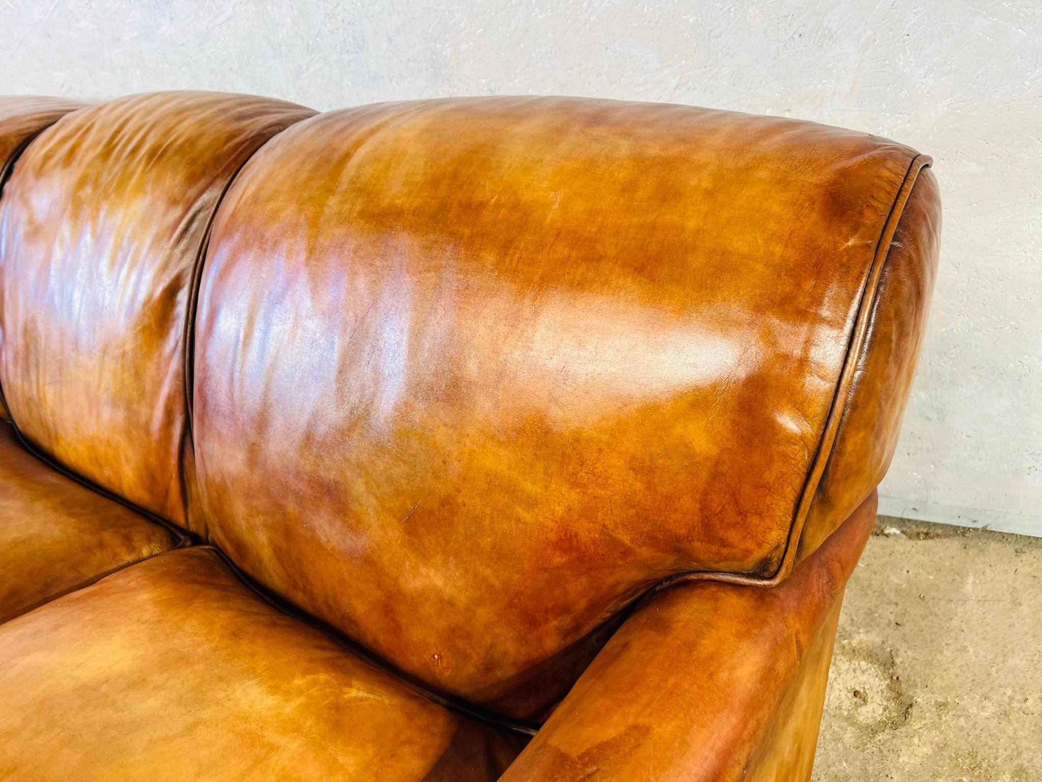 tan distressed leather sofa