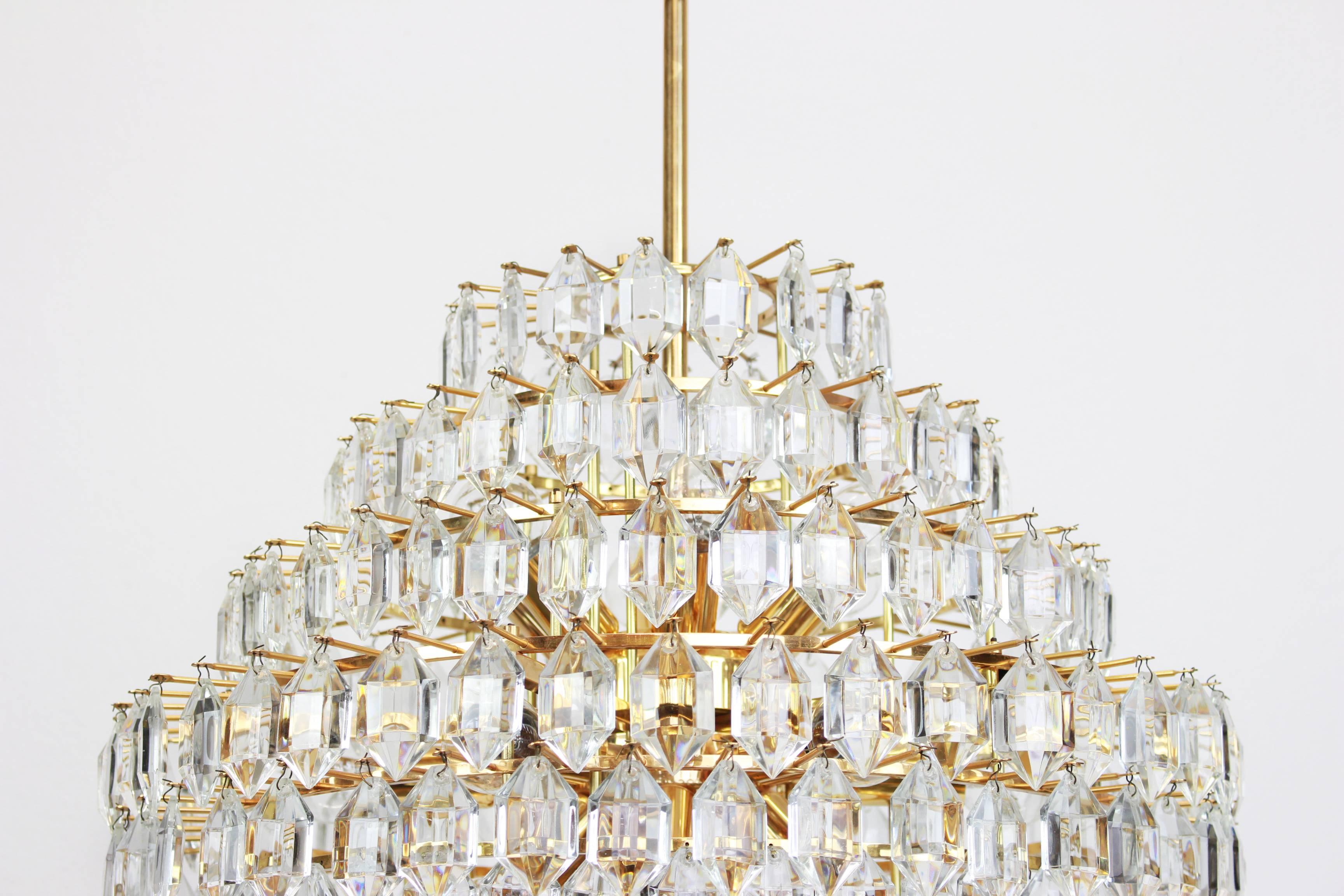 Midcentury Bakalowits chandelier, brass and crystal glass, Austria, 1960s.

A stunning nine-tier chandelier by Bakalowits & Sohne, Austria, manufactured in circa 1960-1969. A handmade and high-quality piece. The ceiling fixture and the frame are