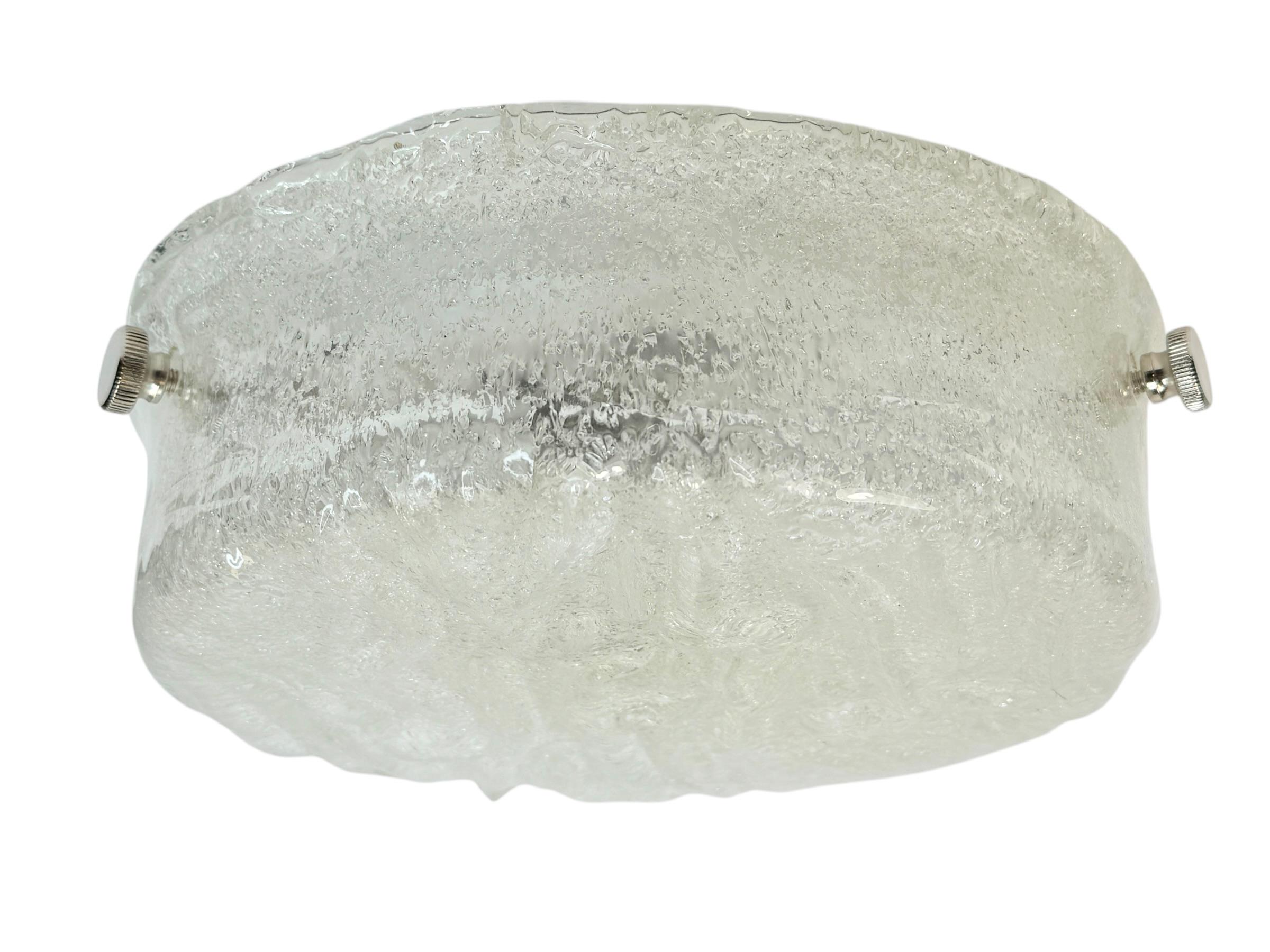 A beautiful heavy Murano glass flush mount made by RZB Leuchten Germany, circa 1970s, in very good original condition. The glass with ice pattern is composed of a metal frame. The Fixture requires an European E27 / 110 Volt Edison bulb, up to 100